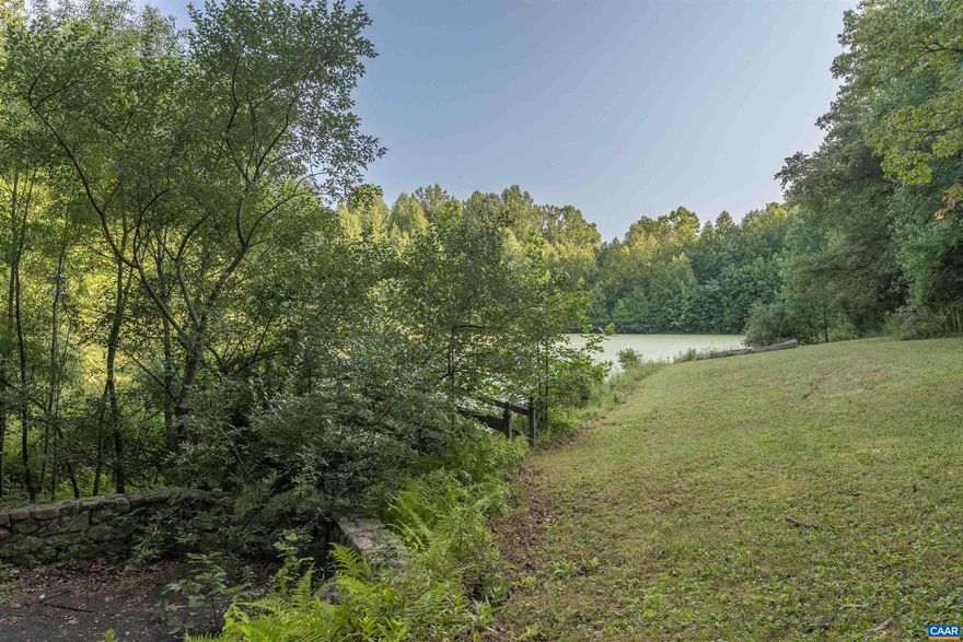 186 private acres located on Oak Park road, minutes from the town of Madison, and easy access to route 29. The land is very private with pastoral and mountain views, and includes a 1.5 acre stocked pond.  The land is in three tax map parcels, and does have additional division rights, making it ideal for a conservation easement. The property includes a 1960s ranch house, and other dependencies, all in need of renovation. Roughly 15 acres are open, and the remainder are in mixed hard woods.