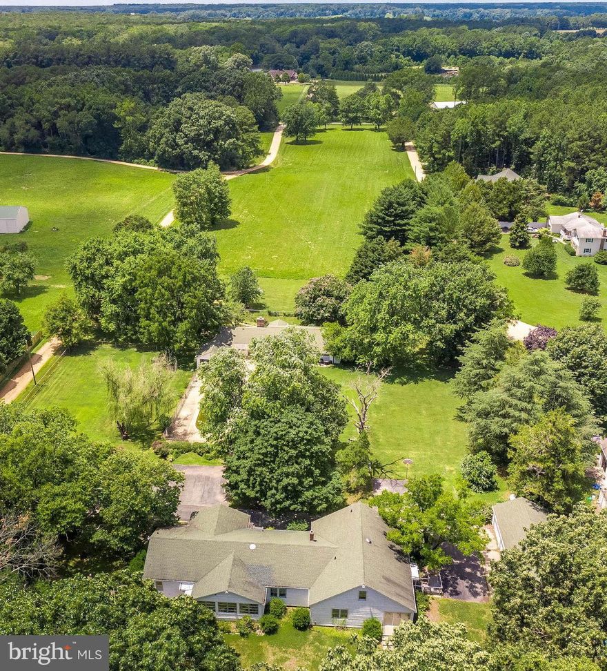 7 acres in St. Marys City located on St. Inigoes Creek. Large Rambler with finished basement. Harwood floors throughout main level. Property has two homes, in ground pool and 4 car detached garage. Main home has 4 bedrooms, 3 baths. Private pier with boathouse. Great opportunity to own waterfront property!  Guest house is being rented for $1150/month. 5 acre field gives privacy.