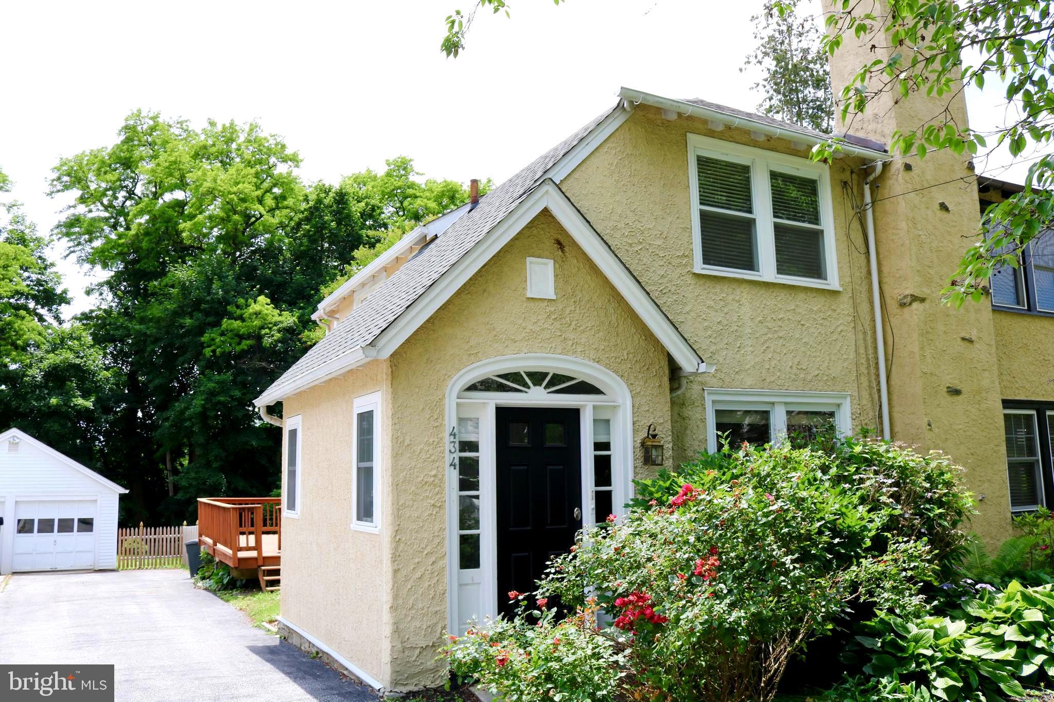 Charming twin home for rent at 434 St Davids Avenue, Wayne, offering modern living with timeless appeal. This residence captures attention with its classic black front door and cottage-style stucco exterior, complemented by lush landscaping and vibrant blooming roses.
Step in from the heat, and feel the cool air from newly installed AC mini splits. Upon entering, a welcoming vestibule with a new full bath and closet sets the stage. The home features hardwood floors throughout, seamlessly connecting the newly updated kitchen and living spaces. The living room invites relaxation with its beautiful stone fireplace, leading into a dining room highlighted by a built-in corner closet with a glass door. The kitchen, equipped with all new appliances, offers a picturesque view of the deck and backyard, perfectly balancing style with everyday functionality.
On the second floor, three well-appointed bedrooms ensure comfort with ceiling fans, and a full bath featuring a tub adds to the convenience of the living space. The primary bedroom stands out with its custom walk-in closet, offering generous storage options. The home also includes air conditioning for seasonal comfort and a basement for additional storage or flexible use.
Conveniently located near Saint Davids Train Station, this home offers easy access to transportation options. In addition, it is close to the vibrant shops and restaurants in Downtown Wayne, providing an array of dining and shopping experiences. Situated within the desirable Radnor School District, this home combines comfort and community appeal, offering the perfect blend of convenience and modern living in a sought-after area.