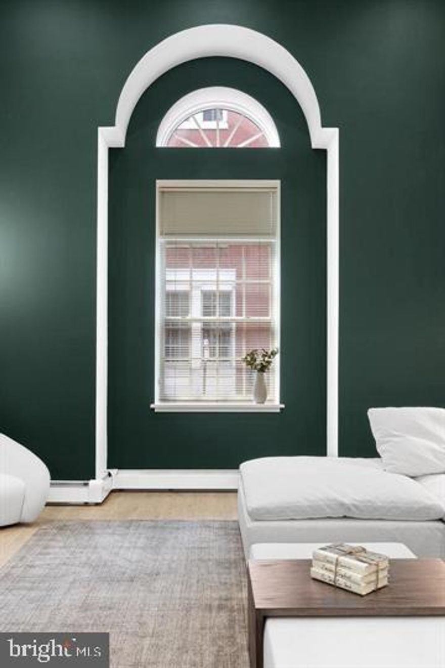 WOW! Unit 104, also known as Biddle Manor, is one of the largest 2-bedroom homes at the coveted Willings at Independence Park— complete with deeded PARKING and a climate-controlled STORAGE UNIT. A dramatic spiral staircase greets you upon entry, leading into the sun-filled living and dining areas with hardwood floors and recessed lighting. The stylish kitchen features stainless steel appliances, ample cabinetry, and a modern layout perfect for entertaining. Also on this level: a powder room and laundry room. The primary suite can be conveniently located on the first floor, with an expansive walk-in closet and spa-like bath featuring a soaking tub and shower. Or, enjoy the second-floor bedroom as your private retreat, overlooking the living room with an open, airy feel. This suite also offers a generous walk-in closet and a full bath including a soaking tub and separate shower. You’ll also find a storage room on this level with a brand new HVAC unit (2025) and hot water heater (2025). With west-facing windows, the home is filled with glorious natural light, especially at sunset. The Willings combines historic charm with modern convenience: strong 19th-century architecture, concierge service, 24-hour doorman, and a serene courtyard shared with Old Saint Joseph’s Church—all just steps from theaters, museums, fine dining and the best of Society Hill. With its thoughtful design, primary location, and unmatched historic character, this home offers a rare blend of sophistication and modern living. Don’t miss your chance to make it yours!