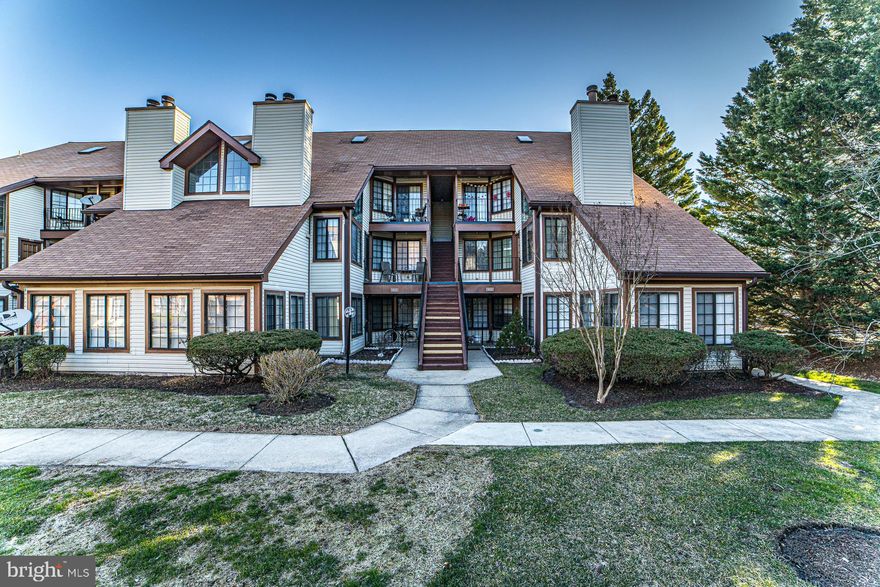 Beautiful large condominum with loft in Tiers of Manchester Lake!   Updated kitchen with Stainless Steel Appliances and sleek stone counters.  Light filled living room with fireplace and loft that overlooks.  The master bedroom is spacious with walk in closet and an oversized tub.  Second bedroom is a great size and hall bathroom gives each room their own space.  Washer and Dryer in unit!  Garage parking spot and also 1 spot in the driveway.  Pool, Tennis, Playground fill the community. Perfect commuting location, 95, 395, 495 minutes away along with VRE and metro.  Low condo fees at this location is unheard of.