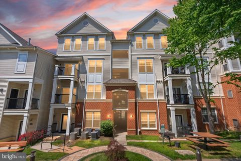 Photo of 11381 Aristotle Drive #10-410, FAIRFAX, VA 22030 (MLS # VAFX2305980)