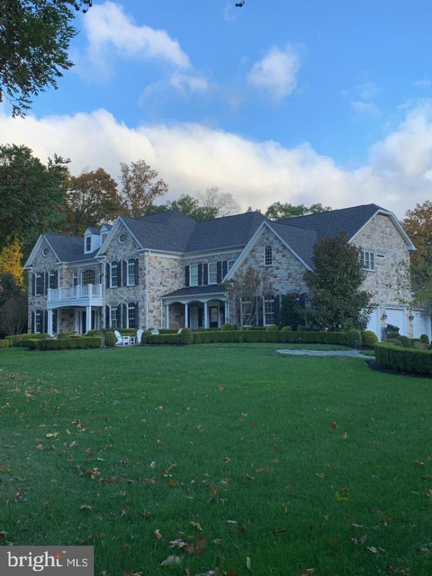 Stunning Stone Front K HOVNANIAN Model situated on almost 15 acres.  No detail has been spared on this stunner.  7 Bedroom and 8 Bathroom home with custom Lewis Aquatech heated pool and 2 open air pavillions with full travertine decking.  The kitchen features a level 4 granite and all high end viking stainless appliance package.  This is a perfect 10 and located just minutes from the future silver line metro!