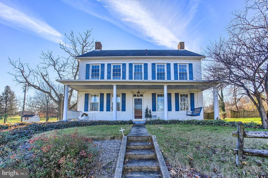 Situated on just over an acre of land, this beautiful well-kept farmhouse dates back to 1843! Character, history and charm speak volumes in this home that was part of an estate once known as "Kin Mar" by the descendants of the Doctor that built it! Features include a spacious dining room with French doors opening to patio, pocket door pantry, antique bar from a York Hotel, historic kitchen with colonial era fireplace, built in shelving, long entrance hall with a beautiful staircase curving up to the third level, large formal living room, transom windows, original hardware, a back stair case to a bonus room for an office or den. Second level has 3 bedrooms with a 4th bedroom option being used as a dressing room & closet to the adjoining primary bedroom. A finished attic with built in shelving & storage crowns this gem with additional hobby and game room space! Detached oversized garage boasts 3 bays, 1 is oversized to accommodate your camper or boat, hook up for welding and spacious second floor area for storage or hobby shop with double door access at both ends. You'll be dreaming of making your own family history and entertaining memories here as soon as possible! Call for your showing today!