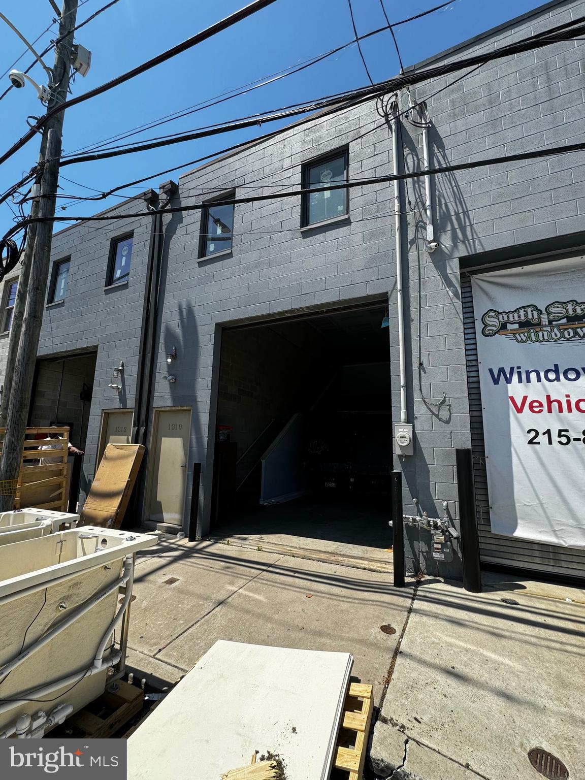 The building, constructed just 6 years ago, presents an exceptional opportunity in a prime location that attracts a wide range of potential customers on a daily basis due to its high traffic volume. Conveniently positioned near the 34th Street on-ramp to I-76 East, this property offers outstanding visibility from both I-76 and 34th Street, ensuring maximum exposure for your business to the thousands of passing vehicles each day. The spacious double garage/warehouse, measuring 32x48 and occupying 100% of the lot, features two 10-foot-high doors and an impressive interior height of 23 feet, providing ample space for your business operations. In addition, it includes a second-floor partial mezzanine and two fully ADA-compliant half baths on the first floor. With 4 more years remaining on its Real Estate tax abatement, this building is in impeccable condition. The CMX2 zoning allows for a height of 5 stories, making it possible to construct several apartments for added revenue and value.
