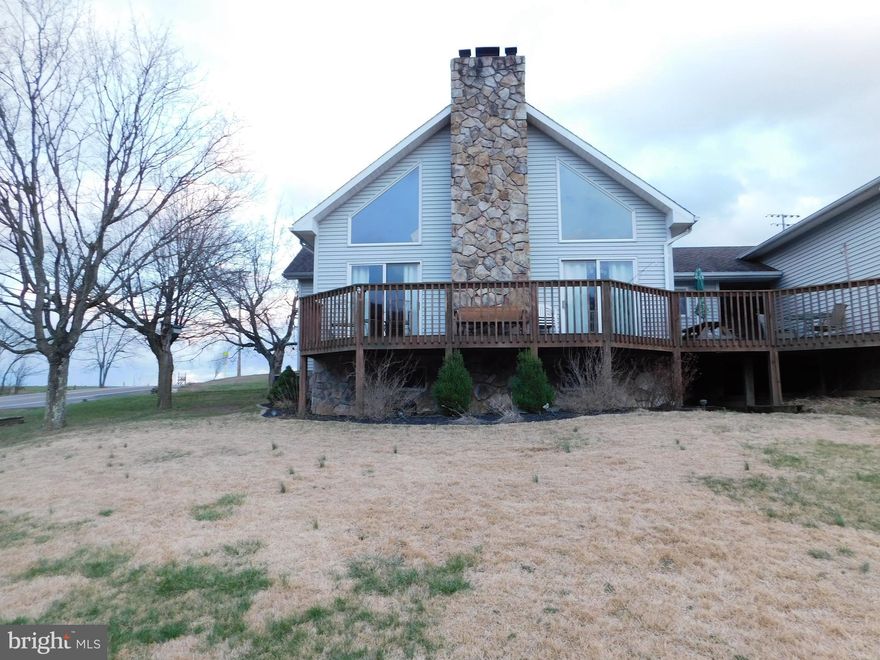 Move right in this 3 bedroom, 3 bath house. You will love the tons of light that flows into you dining room/ living room combo with all the windows and the stone fireplace from floor to ceiling with gas insert and hardwood floors. Use the master bedroom on the 1st floor as as master or current owners use the upstairs as their master retreat. Family room in basement for added space.