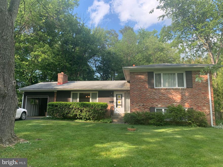 Wonderful Opportunity, over a half acre  gorgeous flat lot. Fixer Upper, Pop Up, New Build or totally livable. 4 Bedrooms 2 and 1/2 baths Split Level Home.  A commuter's dream! Minutes to Tysons Corner and  The town of Vienna. Walkable to Our Lady Of Good Counsel Catholic Church and school. Surrounded by Million dollar homes. Vienna Elementary, Thoreau Middle & Madison HS.