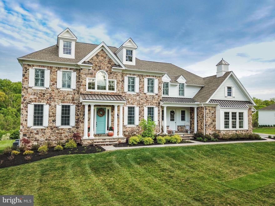 Gorgeous, well designed and perfectly appointed  home on large and most level lot in gated section of desirable Liseter Community.  Priced adjusted providing even more value so make your appointments now.  Five bedrooms including main floor guest suite, the Villanova Weatherstone Model home can be yours today.  Tree lined one way street with scenic and sunset views to be enjoyed from your large private deck while enjoying all the amenities Liseter has to offer. Sunny and wide front to back foyer area is complimented by sweeping oak staircase and extensive wainscoting and moldings.  Formal Living Room and Dining Room flank the hallway which also leads to the heart of the home- the Kitchen, Breakfast Room, Family Room and Office areas.  Gleaming 12 ft marble island provides a special gathering place for family and friends and loads of cabinets for storage and display.  Two dishwashers, wine chiller, Wolf stove and Sub Zero Fridge will make entertaining easy.  Exit to large deck with steps down to flat back yard.  Mud room and sunny office complete this level.  Second floor has 9 ft ceilings, large master suite with well designed walk in closet and full bath, one bedroom with en suite bath and two bedrooms sharing a Jack and Jill bath.  Cozy reading nook and laundry room with second staircase to kitchen area complete this level. Convenient to Airport, Corporate Centers, Major Highways and Episcopal Academy.   Click on documents link to view a complete list of upgrades and special features.