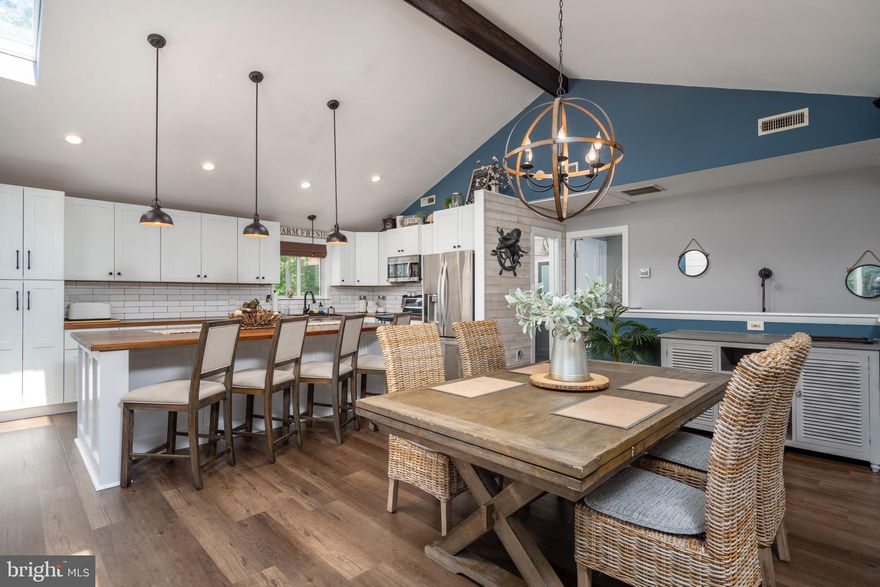 MULTIPLE PRICE REDUCTIONS, MOTIVATED SELLERS!!!!!!!!!!! STOP your search in Ocean Pines, this is the one. 91 Boston is calling your name! This home has been completely redone in almost every aspect since its last purchase in 2018. You name it, they've done it. This is an immaculate 5 bedroom home with tons of living space and a very desirable location in Ocean Pines! This home has an awesome open floor plan with a killer deck setup and fenced in backyard perfect for entertaining or for large families. Large room with a wet bar and another family room downstairs. Peek of the creek across the street perfect for kayaks and close to the South Gate entrance and all it has to offer. Do not miss this one! One car garage for the vehicle and a paved driveway perfect for your guests and family. THIS HOME WOULD THRIVE AS AN AIR B&B OR VRBO, GREAT SET UP WITH MULTIPLE ENTRANCES, RENTAL POTENTIAL IS HUGE!!!!!!  Brand new roof as of August 30th, 2024.