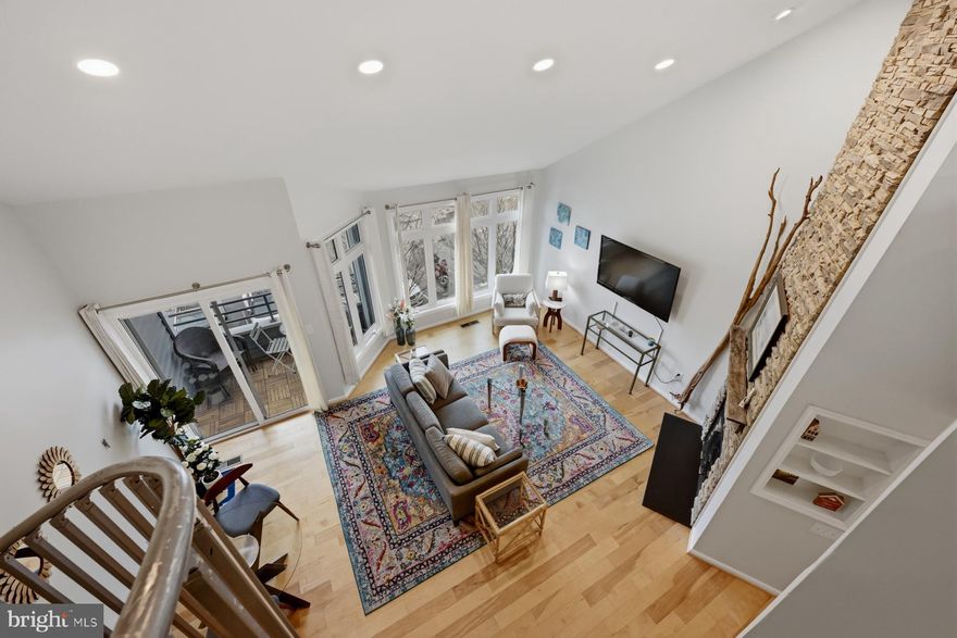 Stunning Loft-Style Condo with Lake Access Minutes from Downtown Annapolis

Step into this beautifully updated 2-bedroom, 2-bath loft-style condo where modern upgrades meet cozy architectural charm. The showstopping floor-to-ceiling stone fireplace anchors the bright open living space, creating the perfect setting for relaxing evenings or entertaining guests.

Natural light fills the home and flows seamlessly to your private balcony, offering a peaceful outdoor retreat to enjoy your morning coffee or unwind at the end of the day.

The gorgeous updated kitchen features quartz countertops, a stylish tile backsplash, and generous workspace—ideal for everyday cooking or hosting friends and family.

One of the home’s most desirable features is the versatile loft, perfect as a home office, guest space, media room, or additional living area.

The spacious primary suite feels like a private retreat with abundant closet space and a beautifully renovated spa-inspired bath featuring dual vanities and an oversized walk-in shower.

Residents enjoy resort-style amenities including a community fitness center, swimming pool, and access to Lake Heron, where kayaking and paddleboarding are just steps from your door.

Located just minutes from historic downtown Annapolis, you’ll love easy access to waterfront dining, charming boutiques, sailing, and vibrant city life.

Major recent upgrades include:
• HVAC (2022)
• Balcony wood flooring
• Added insulation
• Abundant recessed lighting
• Fresh paint throughout
• Glass shower doors in primary bath
• Three ceiling fans
• Keyless entry

Move-in ready and beautifully maintained — this Annapolis gem won’t last. Schedule your showing today.