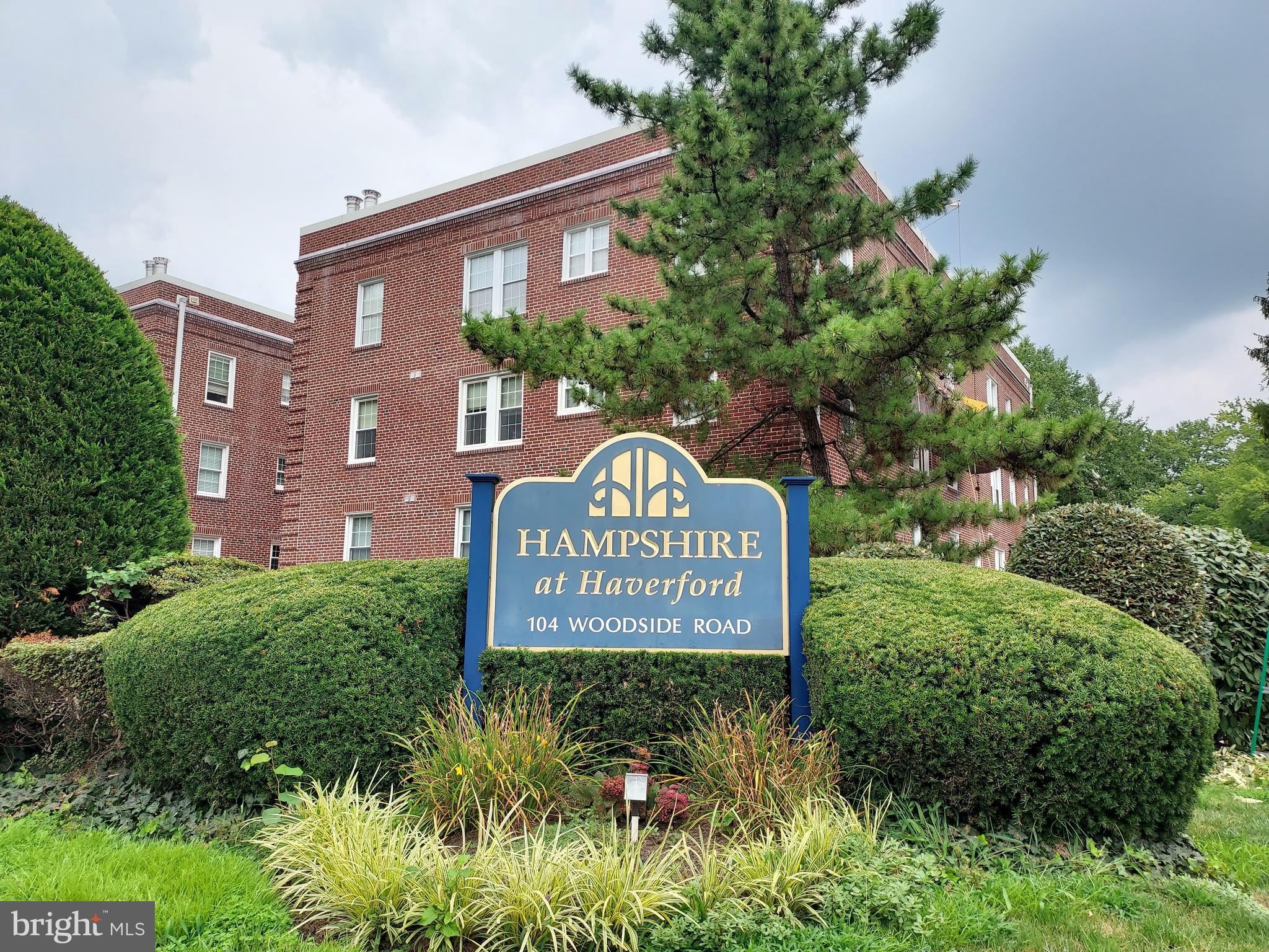 Act quickly! This Main Line penthouse two bedroom two bath unit in a premium condominium community is priced to sell quickly to the right buyer with vision for a solid blue chip investment or for a homebuyer ready to custom finish their dream home! Pet friendly building!
Hampshire at Haverford is a luxury condominium community, with lush landscaping and is the rare condominium along Montgomery Avenue with a private community pool. The location can’t be beat, a short walk to Suburban Square shops and restaurants, Trader Joe’s, Ardmore shops, and the Ardmore SEPTA and Amtrak train station, great for commutes to Philadelphia and NYC. This is a gracious, pre-war elevator building, and includes a reserved parking space.
This penthouse unit has two large bedrooms with extensive closet space, two full bathrooms, a working fireplace and in-unit laundry room. Ceilings are higher on this floor, and the western exposure of all rooms provides bright afternoon sunshine to every room. This unit is ready for your personal touch, as the kitchen and bathroom are ready to be redone, but provide good space. There are other interior wall and ceiling repairs required.
Closing must be on or before September 18, 2025, and the seller requests three months lease back.