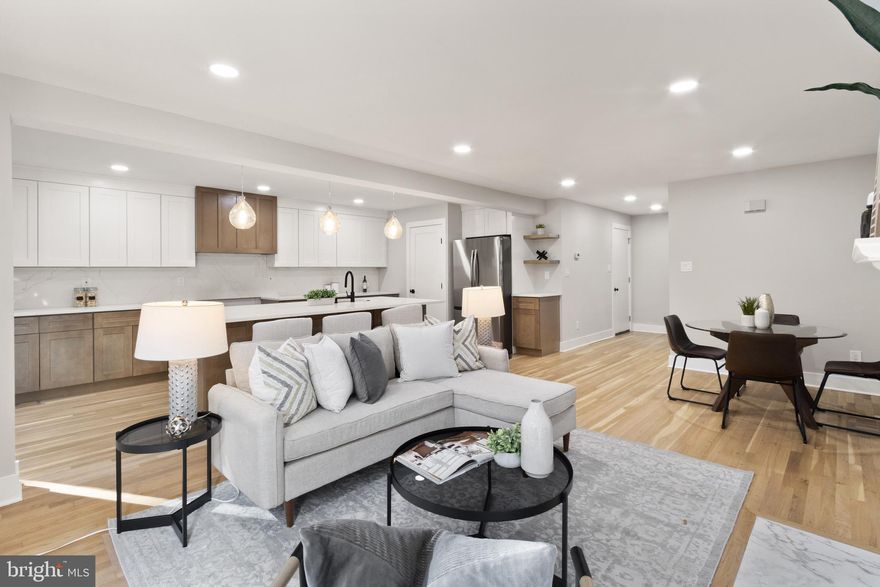 Experience luxury living in the heart of Arlington with this stunningly renovated townhome, offering a perfect blend of sophistication, functionality, and comfort. From the moment you arrive, you’ll appreciate the private driveway and one-car garage — a rare find in such a prime location.
Step inside to discover a completely renovated interior with gleaming hardwood floors on the main and upper levels, recessed lighting, and modern fixtures and finishes throughout. The open-concept main level is anchored by a cozy fireplace and flows seamlessly into the expansive kitchen, where no detail has been overlooked. The chef’s kitchen features quartz countertops and backsplash, stainless steel appliances, a built-in microwave drawer, coffee bar, spacious island, and ample cabinetry for storage and style.
Two sliding glass doors lead from the main living area to a private brick-walled garden oasis — complete with a Trex deck and rear gate — offering the perfect retreat for morning coffee, evening entertaining, or quiet relaxation.
Upstairs, the primary suite is truly a showstopper, boasting an enormous walk-in closet with a custom organization system and a spa-inspired en suite bathroom featuring a dual vanity, open shower, and designer tile. Two additional spacious bedrooms and a second full bathroom with dual vanity and tub/shower combo complete the upper level.
The fully finished basement extends your living space with LVP flooring, a second fireplace, two versatile bonus rooms, and a third full bathroom — ideal for guests, a home office, gym, or media space.
With 3 bedrooms, 3.5 bathrooms, and upgrades at every turn, this home offers the perfect blend of timeless design and modern luxury. Every detail has been thoughtfully curated — from the hardware and tile selections to the lighting and layout — making this Arlington gem a true one-of-a-kind residence.