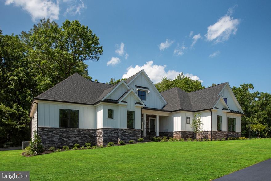 Introducing an exquisite opportunity to build your dream home in the picturesque Rosni Estates waterfront community of Fredericksburg.

This example is the luxurious SMITH home design that includes 3 spacious bedrooms, and 3 elegant bathrooms spread across 2,704 square feet of meticulously crafted living space. The open-concept floor plan is enhanced with hard surface flooring throughout the main level, creating a warm and inviting atmosphere. The chef’s kitchen is a culinary delight, featuring quartz countertops, custom cabinetry, and top-of-the-line stainless steel appliances, all illuminated by modern recessed lighting.

Each home comes with a minimum 3-car side entry attached garage, offering ample storage and convenience. Additionally, there is plenty of space to add personalized structures, should you desire. The exterior is accentuated with stylish stone water tables, adding a touch of elegance to the overall design.

With a limited selection of exclusive homesites, you have the freedom to choose from a curated portfolio of plans or bring your own vision to life. This is the essence of the Custom-Building Experience—if you can dream of it, we can help make it a reality.

Don’t miss this rare chance to create a haven that perfectly fits your lifestyle in a coveted location. Discover the endless possibilities of luxury living in Fredericksburg today. Photos are representative of the Bryton Custom Homes craftsmanship and finishes, they are not of the SMITH home design. Inquire about the other available lots and models in this community.