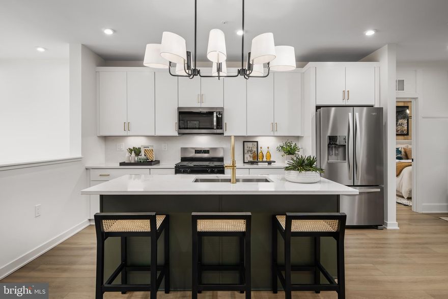 Our highly sought after Edmond model home is now for sale at Commonwealth Place at Westfields. This award-winning home is filled with thoughtful upgrades perfect for your lifestyle. With all of the living space located on one level, you are steps away from anything you may need! Your light filled main level features a stylish, kitchen with earth toned cabinetry, gold finishes, and warm blonde luxury vinyl. Your kitchen opens up to a cozy eat in space and spacious great room overlooking a large balcony space. Your primary bedroom is right off the living space featuring spa-style bath and generous closet space. This home also features a secondary bedroom and bath just across the hall from the primary. Washer/dryer are included along with a 2-car tandem garage and large pantry. April/May 2026 move-in. Furniture sold separately, please inquire with the sales team for details. This one will go fast – give us a call today!