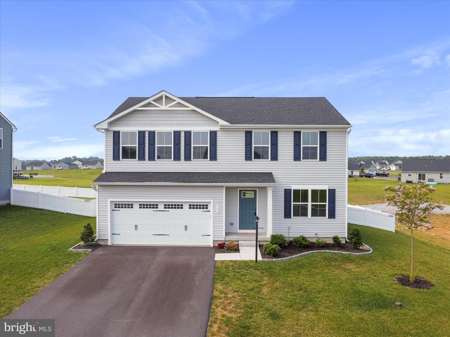 Why wait for a new build when you can own this like new home without the wait! Nestled in the charming Cardinal Pointe community, this home is move in ready and already has a finished basement, vinyl fence and a rear patio.  With five spacious bedrooms and three and a half bathrooms, this home has it all. The heart of the home features an open floor plan, seamlessly connecting the family room to the kitchen equipped with stainless steel appliances, an island and upgraded countertops. Enjoy the luxury of a primary suite with a walk-in closet and a beautifully appointed bathroom featuring a two sinks and  walk-in shower. The fully finished basement provides additional living space. Step outside to your fully fenced rear yard and private patio, perfect for morning coffee or evening gatherings. With a two-car garage and ample driveway parking, convenience is at your fingertips. Experience the warmth and comfort of this exceptional home, where every detail has been thoughtfully crafted for your lifestyle.