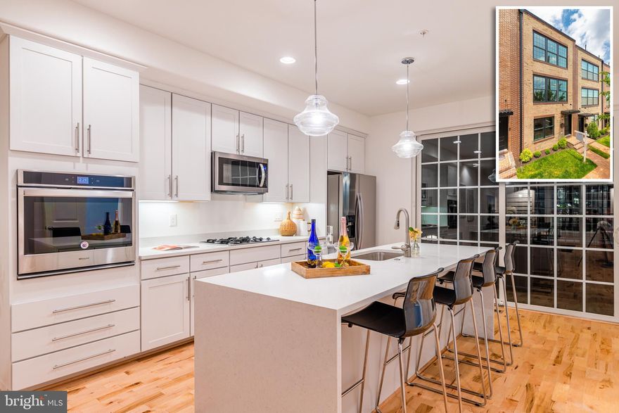 BEAUTIFULLY DESIGNED NEWLY CONSTRUCTED GARAGE TOWNHOME WITH 4 FINISHED LEVELS AND OVER 2,400 SQ. FT. OF LIVING SPACE! Entry level office/3rd bedroom with a full bath, open main level with ample sunlight, spacious living room w/ gas fireplace, large dining area, gourmet island kitchen w/ ss appliances and Quartz countertops, main level half bath, 3rd level Master suite w/ walk-in closet w/ built-ins, and a full bath w/ dbl vanities, and walk-in spa shower, bedroom level laundry, 4th level family room w/ half bath that leads out to the 2 tier rooftop terrace with commanding views, and a 2 car garage for easy, secure parking! Available for immediate delivery - only 3 units left! New Construction Tax Credit! Buyer to pay all transfer and recordation taxes.