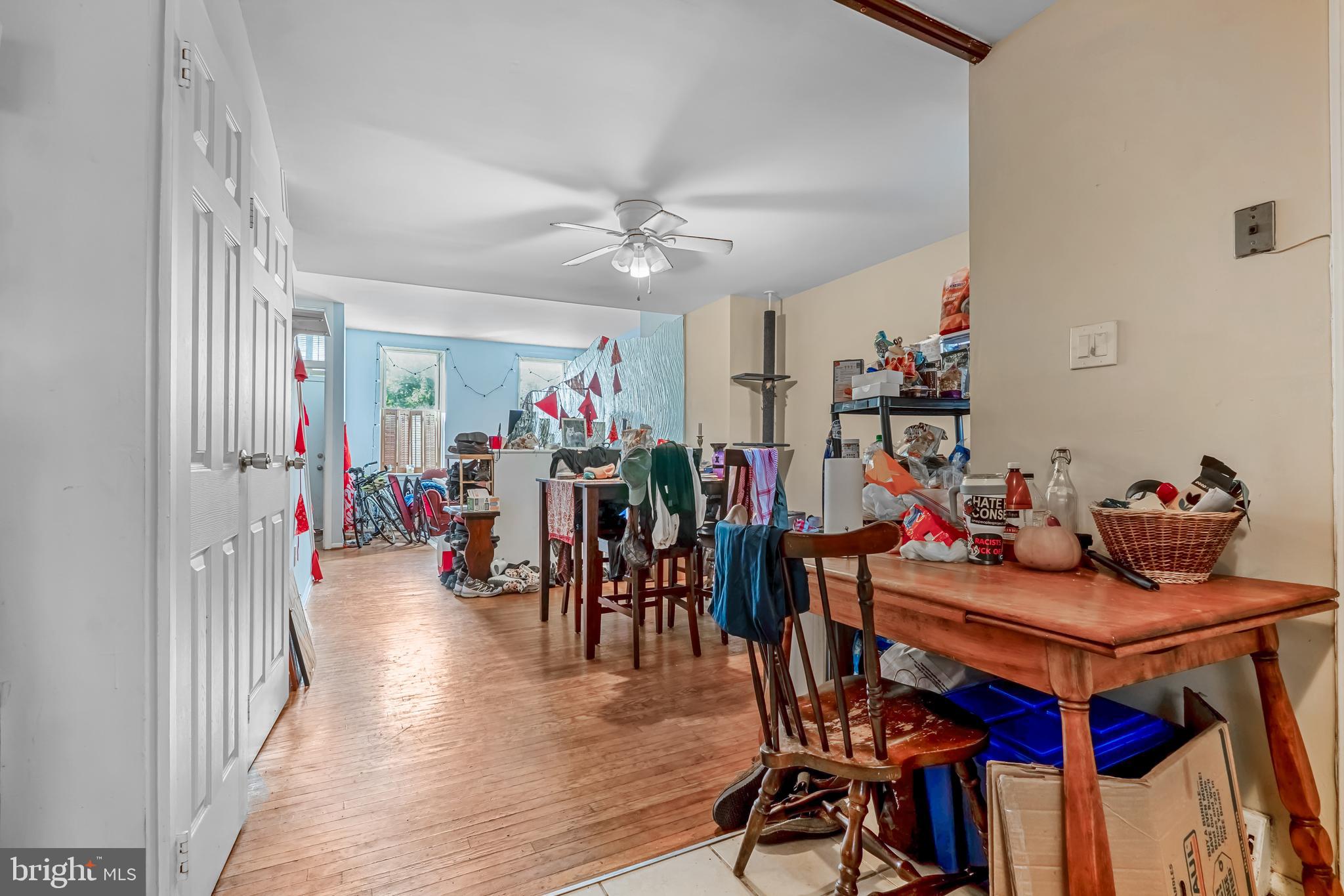 Have a big family and want to live in Northern Liberties? Presenting the only available 6-bedroom house on an impressive 89-foot-deep and you can get it for under 500k. Perfect for an FHA 203K loan to finance at low cost some of the cosmetic repairs right away. Currently tenant-occupied until July 31, 2025, at $2,850/mo & then month-to-month. 3D tour available.
There's a reason why this neighborhood has been rapidly appreciating. Within walking distance, you'll find popular restaurants, cozy cafes, grocery stores, unique boutique shops, tennis courts, and parks. The Piazza and Liberty Lands Park, just a 10-minute walk away, offer relaxing outdoor spaces, live events, and opportunities to meet neighbors. Entertainment options, such as North Bowl and Johnny Brenda’s, contribute to the area's vibrant nightlife and social scene. Beyond dining, Northern Liberties is celebrated for its rich culture and artistic atmosphere, boasting local galleries, creative hubs along N 3RD Street, and unique landmarks that enhance the community's charm. Residents enjoy easy commuting via SEPTA’s Market–Frankford Line and bike-friendly streets. The neighborhood thrives on its community spirit, evident in regular farmers markets, festivals, and year-round events, appealing to both residents and investors.
Built in 1920, this exceptionally spacious single-family home covers nearly 2,300 square feet, offering a rare 6-bedroom layout with bathrooms conveniently located on both the second and third floors. Situated on a sizable lot (89 feet deep and 19 feet wide), the home features a huge backyard ideal for family gatherings and peaceful outdoor enjoyment.
When you enter the house, you’ll see the open-floor layout, which is perfect for entertainment. There is also a beautiful glass feature separating living & dining areas. Facing west, the living room is bathed in natural light during golden hour, creating a warm and inviting atmosphere that is complemented by hardwood floors. The kitchen, while older, has gas connections, which true cooking enthusiasts prefer. With minimal investment, such as adding a peninsula and upgrading appliances, the kitchen can be completely transformed.
The second and third floors have similar layouts, each featuring a small rear bedroom, a medium-sized middle room, a bathroom, and a spacious front bedroom. The home includes central heating, window-unit air conditioning, and a washer and dryer in the basement.
Yes, this property will need updates to achieve its full potential—primarily in the bathrooms, kitchen finishes, and some paint touch-ups—which is reflected in the price. However, after these improvements, you’ll own one of the largest homes in the area, having already built considerable sweat equity and positioning yourself to benefit from the neighborhood's ongoing appreciation.