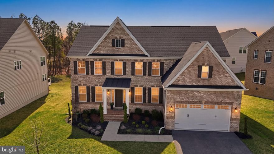 Virtual Tour has been added link added. Additional Photos  will be uploaded! 

Welcome to an extraordinary opportunity in Oak Creek Country Club — Prince George’s County’s premier gated golf course community, where luxury, privacy, and lifestyle converge.

Introducing the distinguished Radford model, a masterfully crafted luxury estate offering nearly 6,000 square feet of refined living across three impeccably finished levels. Perfectly positioned on a premium homesite backing to mature trees and the scenic 5th fairway, this residence delivers the rare combination of tranquil natural views and championship golf course frontage. From its timeless exterior architecture to its thoughtfully curated interior finishes, every detail reflects sophistication, comfort, and quality craftsmanship.

 

Main Level Elegance & Functionality

Step inside to expansive living spaces and a layout designed for modern living. The main level features:

A welcoming center entry from the garage, creating a functional drop zone ideal for everyday convenience
A large private office, perfectly suited for executive work-from-home needs
An open-concept designer kitchen with premium cabinetry, expansive countertops, and high-end appliances
Seamless flow into the family and entertaining spaces, all enhanced by natural light and serene golf course views
 

Upper-Level Private Retreats

Upstairs, luxury continues with thoughtfully designed private suites:

A lavish primary suite offering a spa-inspired bath with soaking tub, elegant vanities, and refined finishes
Three generously sized secondary bedrooms — each with its own private en-suite bathroom, providing ultimate comfort and privacy for family and guests
 

Fully Finished Lower-Level Experience

The fully finished lower level transforms this home into a true lifestyle destination, featuring:

A dedicated theatre room for cinematic experiences at home
A private gym, eliminating the need for memberships
A full bath conveniently located adjacent to the gym
Expansive recreation space ideal for entertaining or multi-generational living
 

The Lifestyle at Oak Creek

Living in Oak Creek Club means enjoying over 1,100 acres of rolling landscapes and resort-style amenities, including:

A world-class 18-hole championship golf course
Elegant clubhouse with restaurant & pro shop
Resort-style swimming pools
Scenic lakes & walking trails
24-hour gated security
 

The Smart Buyer’s Advantage

Why wait six months or more for new construction when you can enjoy the convenience of a newly built home right now — and walk into immediate equity? Enjoy the peace of mind that comes with 24-hour gated security — offering privacy and protection from common neighborhood concerns such as package theft, vehicle break-ins, and vandalism. Here, your investment — and your lifestyle — are protected. This is your opportunity to secure a move-in-ready luxury residence without construction delays, uncertainty in build timelines, or rising costs. This is more than a home — it is a statement of success, a retreat from the everyday, and a strategic investment in one of Prince George’s County’s most prestigious gated communities.