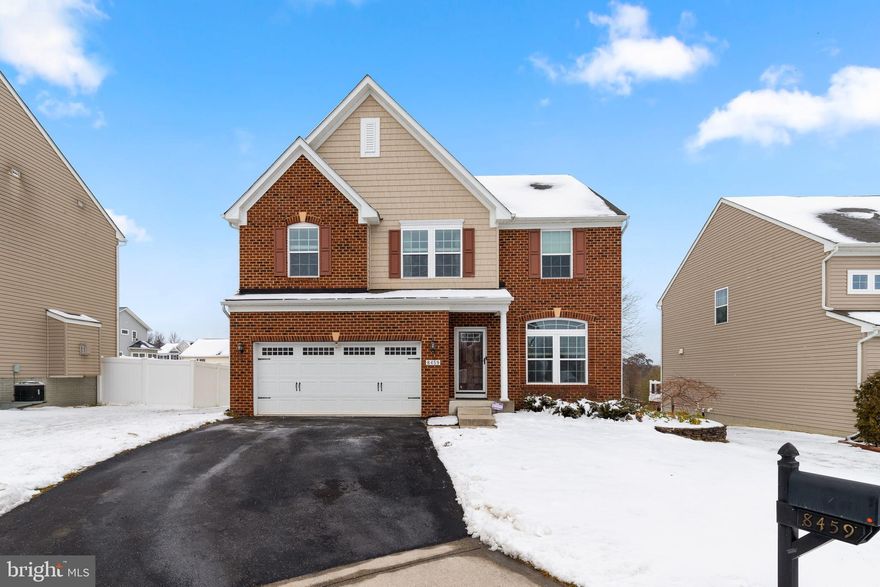 Must see brick front 2-car garage colonial quality built in 2013 on an ideal cul-de-sac lot! Endless upgrades and a tremendous open floor plan include: tall 9' ceilings; gleaming hardwood floors throughout the main floor; gourmet eat-in kitchen w/42" cabinets, granite counters, upgraded stainless steel appliances, custom tile backsplash, expansive center island, breakfast bar w/pendant lighting and atrium door to rear deck; family room directly off the kitchen w/stacked stone gas fireplace , raised hearth and stone mantle; elegant dining and living rooms w/extensive moldings, chair rail and crown molding; main floor powder room w/pedestal sink; hardwood staircase leads to the upper level w/4 generous sized bedrooms and 2 full bathrooms; upper level  laundry w/front loading washer/dryer; owner's bedrooms w/double walk-in closets; spa like owner's bathroom  w/double bowl granite top vanity, extensive tile work, soaking tub and separate shower; 2nd full bathroom w/double bowl granite top vanity; finished lower level w/expansive rec room, an amazing built-in wet bar ideal for a super bowl party, easy care plank floors, recessed lighting, 3rd full bathroom, full size window and 2 large storage/utility rooms. Laid back HOA only costs $200 per year. A fantastic location minutes to shopping, restaurants and major commuter routes such as I-95. Some photos are from when home was previously staged. Zoned for Howard County's newest school district - Elementary (2018), Middle (2014) and the newest high school in Howard County (2023), just minutes away from the home.