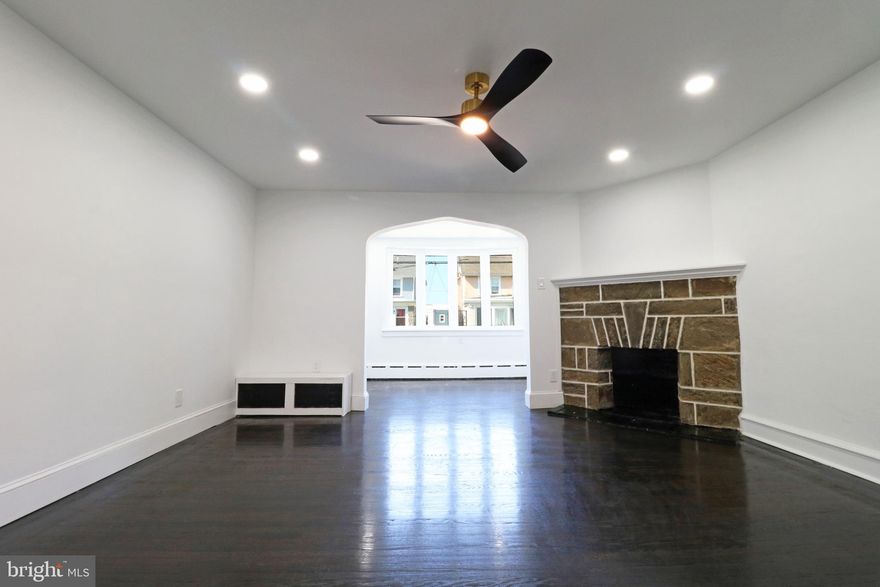 Welcome to 939 Serrill Avenue, a beautifully renovated twin in the Cobbs Creek neighborhood offering both modern updates and plenty of living space. With four bedrooms and two full bathrooms, this home is an excellent fit for a larger family or anyone in need of extra room.

The exterior and interior have both been freshly painted, giving the home a crisp, move-in ready appeal. Step inside through the enclosed front porch and into the bright and open first level, where refinished flooring, recessed lighting, and stylish new fixtures create a warm and contemporary atmosphere. The flowing layout makes it easy to enjoy everyday living as well as hosting family and friends.

The lower level expands your options with a partially finished basement that includes the second full bathroom. This space is perfect as a recreation area, home office, or guest suite, and it also provides a walkout to the garage and rear yard for added convenience. Seller Offering a 1 year Home Warranty for added convenience!