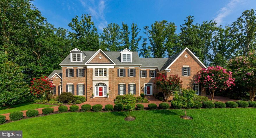 One of a kind, custom designed home nestled on a beautiful wooded one acre lot features something for everyone: gourmet kitchen w/ custom cabs, 2 story great room, 6 car side load garage, finished bsmt with in-law suite and 2nd full kitchen. Ext features include: circular paved driveway, flagstone patio with outdoor kitchen and recessed hot tub. Dynamite location just mins to 95 and Ffx Cty Pkwy.