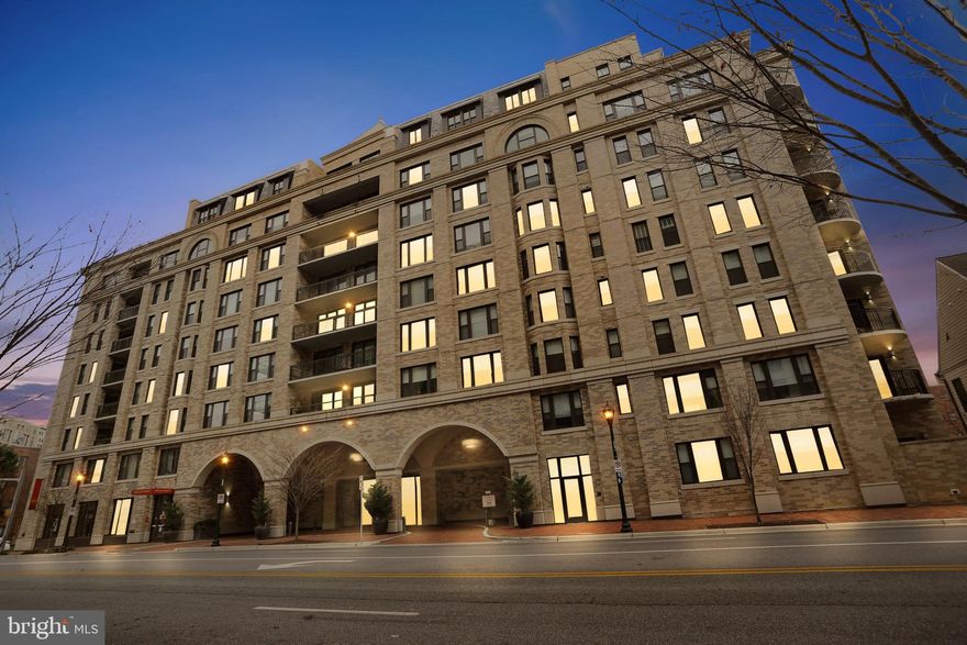 This luxurious two-bedroom, two full bath home with a balcony is in the boutique Stonehall Condominium in downtown Bethesda.  Impeccably maintained, the Stonehall Community features 46 spacious residences located steps from Harris Teeter, NIH, Walter Reed Medical Center and the new Marriott International.  Convenient to Medical Center and  Bethesda Metro Red line stops.  Enjoy everything downtown Bethesda has to offer, including shopping and dining.  
This spacious condo has hardwood floors and large windows, filling the home with natural light. Its superb craftsmanship and custom details include: Gourmet kitchen with Bosch appliances, gas cooktop and quartz countertops with seating, Kohler fixtures throughout and Hunter Douglas blinds. The kitchen, living and dining room combination offer an expansive, open concept ideal for entertaining.  The living and dining rooms have direct access to a large private balcony, the perfect place to enjoy morning coffee or an evening cocktail.  
The living areas and bedrooms are separated for privacy.  The Primary bedroom has a walk-in closet with custom shelving and a bath with a soaker tub/shower,  large vanity and custom built -in storage.  Located across from the second bedroom, the second full bath has a walk -in shower, a large vanity and a laundry closet with a full -size washer and dryer.  This home shows like a model!  Unsurpassed building amenities include a state-of-the-art fitness center, three rooftop decks, clubroom, seven days a week concierge service, a full-time on-site community manager and it is pet friendly. Welcome Home!