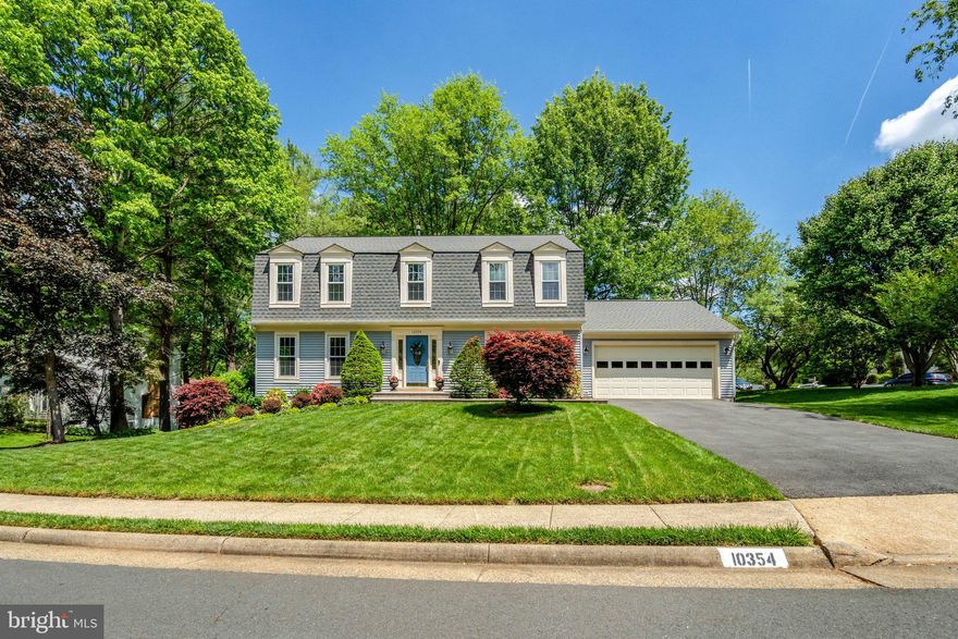 You will find 3484 sq. ft. of finished living space, and 4000 total square footage, in this Mount Vernon centered-hall colonial home beauty.   This home consists of 5 Bedrooms plus a flex/office room off of MBR, and 3.5 bathes. An addition was   added in 2009 to the family room and below to the walkout basement.  Located in Burke Centre on a large corner lot, much love and attention to detail has gone into this home. 
This newly roofed home, (April 2026), has many little extras which include lots of natural light beginning with the beautiful hardwood foyer entry, and continuing into the partially vaulted, oversized family room with gas fireplace, that has been the heart of the home and features a bay window. Off the kitchen is the extended breakfast nook with picture window, with easy access to the large, low maintenance,  Azek engineered deck with accent lighting. Premium vinyl windows with a lifetime warranty are throughout the home. The kitchen features new stainless-steel appliances, plenty of cabinet space with pull-out kitchen cabinet shelves and beautiful new quartz countertops. Ceiling fans with lights have been installed in all 5 bedrooms. Extra R-30 insulation has been added in the attic make the 2nd story very pleasant and temperature is easily controlled. Throughout the home you will find tons of storage beginning with large bedroom closets. After a long day enjoy the heated Jacuzzi tub located in the upstairs hall bathroom. The basement is about 75% finished and includes a large family room area, a wet bar, a wall of storage closets and the 3rd full bath with a closet. The biggest surprise is the 18’ 10” x 14’ 4 ft 5th bedroom located behind double French doors with an exterior door leading to the outside. Two double hung windows allow for plenty of natural light in this unique room. This basement is perfect for perhaps an in-law suite, extra guests, or extended family visits. If you are still looking for more storage, you will find an unfinished storage room located under the deck, and a pull-down attic stair access in the oversized 20x24 garage which has floored attic space over the garage for even more of your treasures.
Burke Centre is a friendly community, with five Neighborhoods, five community pools, tennis and pickleball courts, 23 miles of walking trails, with one walking trail going right along the house! Convenient for shopping, schools (Fairview Elementary, Robinson Secondary), and transportation. The Burke Centre Library is within a short walk, and the Virginia Rail Express (VRE) commuter rail Burke Centre is 2 miles away. Metro Bus service is available in Burke Centre. Easy access to the Fairfax County Parkway (Route 286), Ox Road (Route 123), and Burke Centre Parkway.