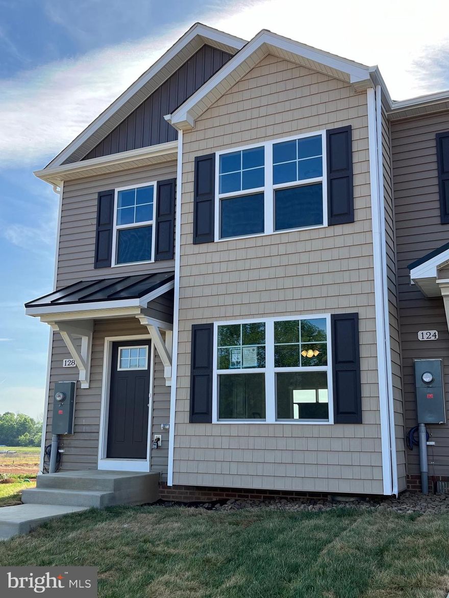 Under Construction.  3 bedroom, 2.5 bath 2-Story town homes featuring spacious room sizes, luxury vinyl plank flooring in main living areas, Bump out in main level family room, and kitchen with island, granite countertops, and pantry.  The Primary Bedroom has vaulted ceiling, walk in closet and full bath with double vanity and tile shower w/ glass door.   10x12 Rear deck included and builder pays 3% closing assistance.  Interior Photos are similar construction, early Spring delivery