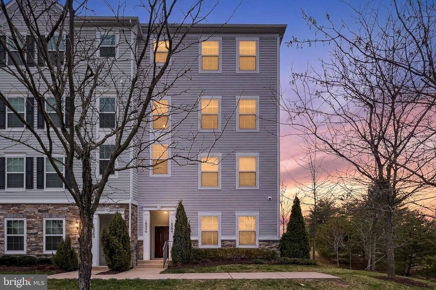 Open House 12 to 3 Saturday 3/21/2026. With over 2,400 square feet of living space, this upper-level end-unit townhome offers ideal east, south, and west exposures, filling the home with abundant natural light throughout the day. Freshly painted from top to bottom, the home welcomes you with high ceilings and an open floor plan on the main level, complemented by recessed lighting and a new lighted ceiling fan. The living room features neutral carpeting and flows seamlessly into the dining area with durable laminate plank flooring. The updated kitchen shines with brand-new sparkling white quartz countertops, 42-inch white cabinetry with soft-close drawers, a pantry closet, recessed lighting, and stainless-steel appliances including a French-door refrigerator, gas range, built-in microwave, and a new garbage disposal. Enjoy morning coffee at the breakfast bar or in the bright breakfast area as sunlight streams in, while the spacious balcony provides the perfect spot to relax outdoors. Laminate plank flooring continues throughout the kitchen and breakfast area. A convenient powder room with a newer vanity, faucet, mirror, and light fixture completes the main level. Upstairs, you’ll find three spacious bedrooms, each with a new lighted ceiling fan, along with a separate den area ideal for a home office, reading nook, or TV room. Two full bathrooms serve the upper level, including the primary suite featuring a huge walk-in closet and an en-suite bath with dual-sink vanity. Neutral carpeting runs throughout the bedroom level, where a full-size washer and dryer are conveniently located. A sprinkler system throughout the home provides added peace of mind. Parking is easy with one garage space with opener and a private driveway space, plus guest parking just around the corner. Ideally located just minutes from I-95, the EZ-Pass Lanes, Fort Belvoir, Quantico, and the Rose Gaming Resort, this home offers both comfort and convenience. Welcome home!