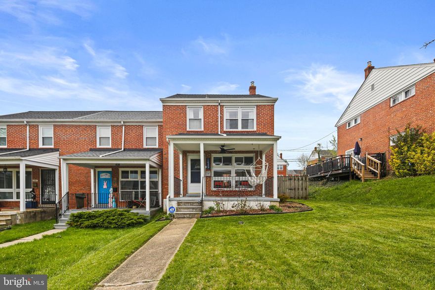 Step into this beautifully updated end-of-group townhome featuring 3 bedrooms and 1.5 baths, where modern upgrades meet timeless charm. The large, covered porch offers such a nice opportunity for some front porch sitting in all kinds of weather. Natural light flows through the many windows of this home on each level. Freshly painted and with shining hardwood floors throughout, this home has a crisp, clean look from the moment you walk in. The renovated full bath offers a contemporary feel with stylish finishes, while the kitchen has been thoughtfully updated with newly refinished cabinets and brand-new stainless steel appliances installed in 2025. Downstairs, the basement has been completely transformed with new carpet, paint, and lighting, with tall ceilings, creating a bright and inviting space perfect for a recreation room, home office, or additional living area. The entire home is enhanced by new light fixtures, adding a warm and welcoming ambiance in every room. Major system updates provide peace of mind, including a new electrical panel in 2023, a roof in 2021, a furnace installed in 2021, and a water heater from 2019. Outside, enjoy one of the largest back yards in the neighborhood, and both front and back yard areas have been landscaped, providing excellent curb appeal and a perfect setting for outdoor relaxation and entertaining. With all these upgrades, this home is truly move-in ready—don’t miss the opportunity to make it yours!