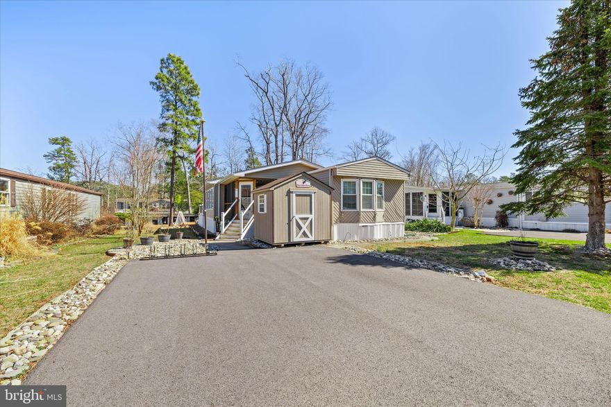 If you’ve been dreaming about relaxed coastal living with water views and space to gather, this home in Rehoboth Bay MHP delivers!

Set along the edge of the community with peaceful wetlands and Bay views behind you, the location alone is something special. Mornings can begin in the four-season sunroom with coffee and natural light pouring in. Evenings? Head out to the screened porch, enjoy a drink at the built-in bar, or relax on the composite deck and take in those beautiful water views. Inside, vaulted ceilings open up the living room and kitchen, creating an airy feel. The home has been thoughtfully remodeled in recent years — new subfloors and flooring, drywall, recessed lighting, fresh paint, updated bathrooms, and a completely refreshed kitchen with new cabinetry, countertops, and appliances. The layout offers two spacious bedrooms at opposite ends for privacy. The rear owner’s suite feels like its own retreat with sliding barn doors, a large closet, step-in shower, newer vanity, and generous linen storage. Beyond the home itself, residents enjoy waterfront living on Rehoboth Bay, a pool overlooking the water and inlet bridge, fishing pier, grassy park areas, playground, tennis courts, and an outdoor fitness zone. All just minutes from Route 1, close to Tanger Outlets Rehoboth Beach, restaurants, medical, movies, and the beach.

It’s the kind of place where you can stay active, entertain easily, or simply slow down and enjoy the view.