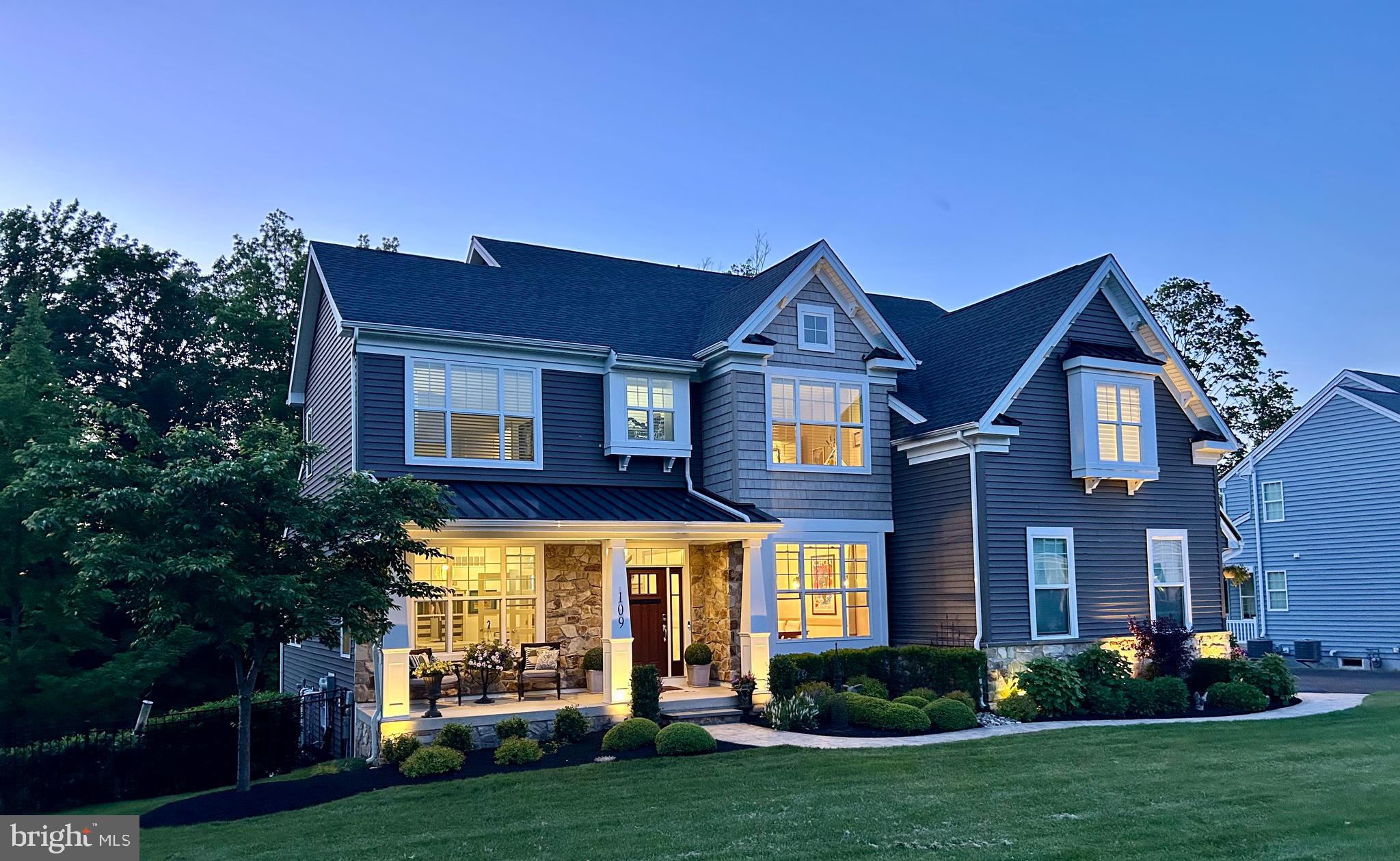 Welcome to 109 Madigan Way—an exceptional residence offering luxury, privacy, and the best of Bucks County living. Perfectly positioned at the end of a quiet cul-de-sac and surrounded by over 14 acres of preserved woodlands and farmland, this beautifully maintained home sits on nearly one professionally landscaped acre in the highly acclaimed Central Bucks School District. Inside, you’ll find a spacious and thoughtfully designed open floor plan with 9-foot ceilings on all three levels, a private office, and a fully finished walk-out basement—ideal for an in-law or nanny suite. The family room features a cozy gas fireplace and adjacent sliders that lead to a massive, maintenance-free deck with integrated lighting, offering sweeping views of your backyard oasis. Additional interior features include: A chef’s kitchen with upgraded beverage refrigerator in the oversized island and double wall ovens. Ceiling fans for year-round comfort. A four-season flex room offering endless possibilities. The master bedroom suite features a built-in Cosmo fireplace, adding warmth and ambiance as well as his and her closets complete with custom closet systems. A luxurious master bath featuring a frameless glass shower, his & her vanities, and spa-like finishes including standalone tub. Sound System throughout the home that can be controlled universally or modified to each room. Garage was finished with a showstopping epoxy system and custom designer garage doors that elevate the home’s curb appeal. Outside you will love the resort-style heated inground pool, surrounded by stamped concrete patios, lush professionally landscaped gardens, and a custom Tiki bar complete with a field stone accent wall, granite countertops, cabinetry, and a wall-mounted TV. Below the deck, is louvered rain system that creates a fully covered patio, perfect for poolside lounging regardless of the weather. Additional Exterior highlights include: Professionally installed irrigation system. Stamped concrete walkways leading to the backyard beyond the fenced pool area. The almost one acre lot extends well beyond the pool fencing. Architecturally designed hardscaping and exterior lighting packages enhance both beauty and security. Pool was built to keep it low maintenance including a self-chlorinating and skimmer system. This home is a one-of-a-kind opportunity to own a luxurious, turnkey property in one of Bucks County’s most prestigious communities. Every detail, from the maintenance-free upgrades to the thoughtfully curated outdoor living spaces, has been designed for comfort, elegance, and functionality. Experience the lifestyle you deserve—schedule your private tour of 109 Madigan Way today! Showings start Thursday, May 22nd, 2025.