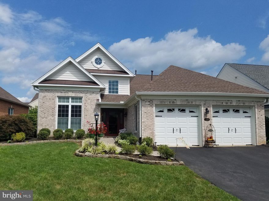 One level living at its best in desirable Regency over 55 section. Beautiful Corsica model, light filled and upgraded: 10 foot ceilings, Gourmet kitchen with Energy efficient s/s appliances and stunning granite counters, a spacious living area with a raised fireplace and a walk-out to a custom fenced patio with fire pit, large primary bedroom with a tray ceiling and a luxury bath with a soaking tub and a separate shower. And many more upgrades and amenities including new HVAC and roof.  Additional storage above the garage with a pull down stair and a mechanical lift.Y ou have to see it; its a stunner.