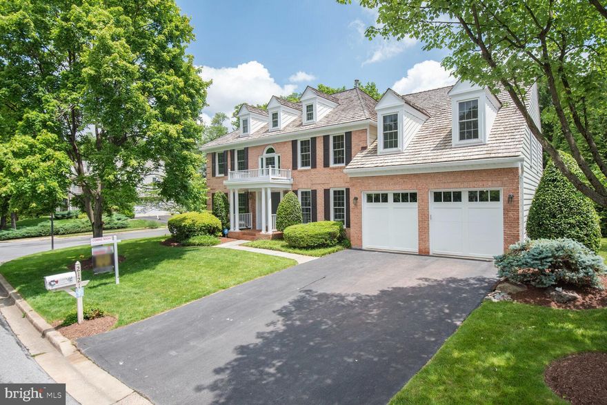 Located on a quiet street in the highly sought-after Arden Woods section of Hallowell in Olney, MD, this beautifully maintained brick colonial sits on one of the largest lots and offers 4 bedrooms, 4.5 bathrooms, 2 dens, and a study across three finished levels with high-end updates throughout. A grand two-story foyer welcomes you into a home filled with natural light, featuring all-new Pella windows and sliding doors, hardwood floors on the main and upper levels, and elegant spaces including a formal living room, formal dining room, and a study with custom built-ins and French doors. The luxury eat-in kitchen is fully renovated with stone countertops, custom backsplash, stainless steel appliances, and connects seamlessly to a butler’s pantry with a built-in wine fridge. The breakfast area leads to a spacious 2-story great room with skylights, an updated fireplace, and access to both a large rear patio and a sun-filled tiled sunroom that opens to a newer composite deck. The mudroom, with washer and dryer, leads to a two-car garage with upgraded openers. Upstairs, the expansive hallway overlooks both the foyer and great room, while the primary suite features a walk-in closet and a spa-like bathroom with dual vanities, soaking tub, shower, and private water closet. The second bedroom has an en-suite full bathroom with a bonus nook, and two additional bedrooms sharing a full hall bathroom complete the upper level. The finished lower level boasts a bright, open rec area with recessed lighting, two dens, and a large storage room. The private rear yard is ideal for entertaining and comes with playground equipment. Major upgrades include a 2017 cedar shake roof, 2019 furnaces, rear patio, rear composite deck, upper level hardwood floors, a full kitchen renovation, and all new windows and sliding doors. Enjoy all the amenities of Hallowell, including a community pool, and a prime location near shops, restaurants, groceries, schools, ICC, Olney Sandy Spring Rd, Georgia Ave, and other major routes. This is a must-see home! Interactive virtual tour available.