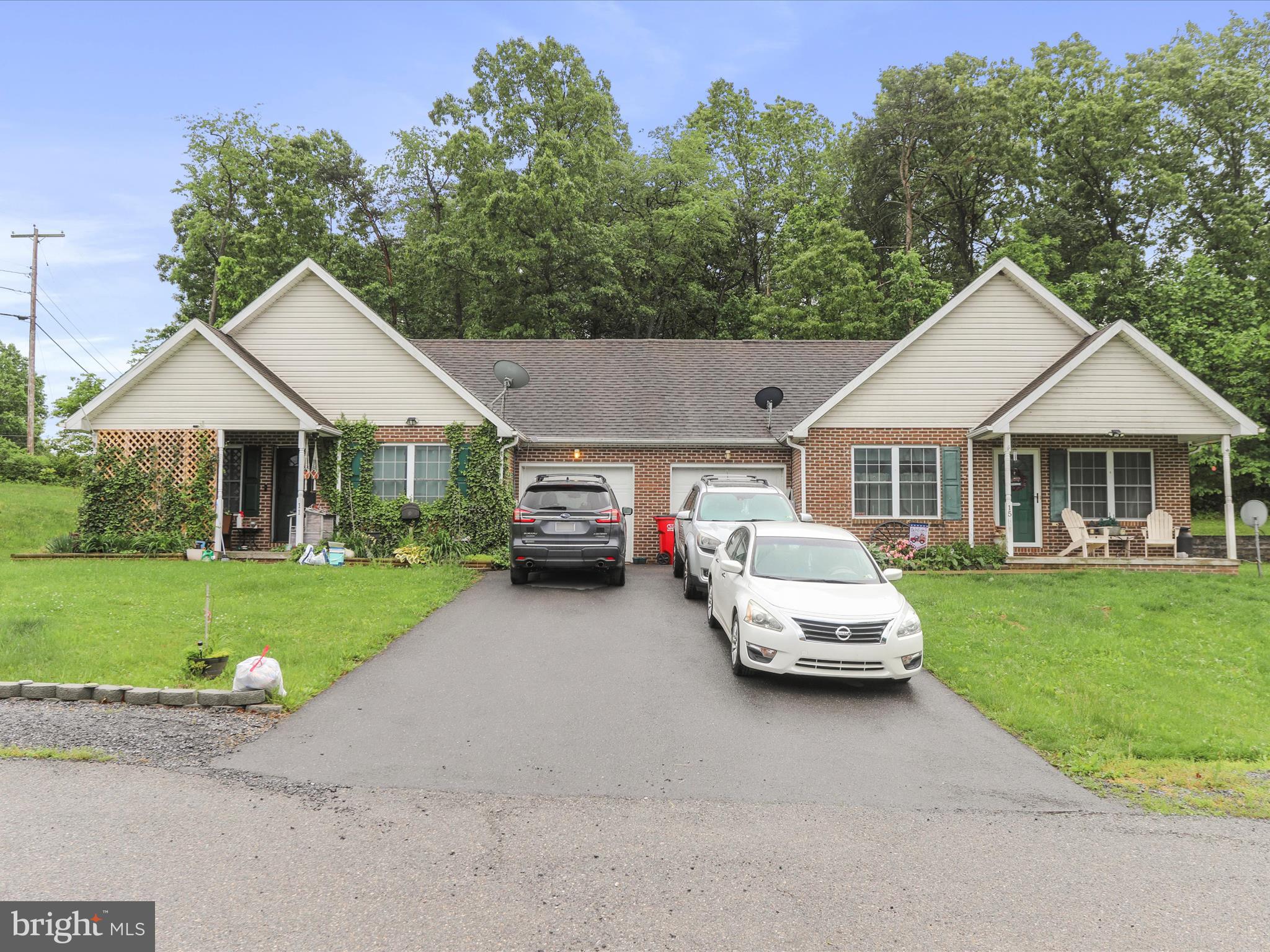 Don’t miss this well-maintained, income-producing duplex situated on a generous 0.44-acre lot. Each side of this thoughtfully designed property features 2 bedrooms, 2 full bathrooms, an attached 1-car garage, in-unit laundry, and a spacious living room and kitchen layout. The primary bedrooms include en-suite bathrooms, adding comfort and privacy. Both units are currently tenant-occupied with tenants responsible for all utilities, making this a turnkey investment with consistent rental income. Tax information listed is not accurate, as it reflects the broader land holdings, not this individual parcel. Whether you're looking to live in one side while earning rental income from the other or simply adding a solid investment to your portfolio, this duplex offers flexibility and value. 24-hr notice required for showings.