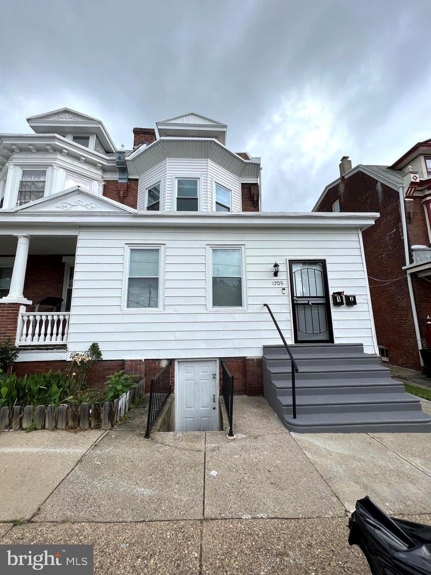 BACK ON THE MARKET....     Check out this rare find. Large 3 story twin duplex. Enter into the enclosed front porch that leads to separate entrances for each unit. Once you enter the first floor you will find there is closet with washer and dryer hookups for easy convenience.  Enter the nice open floor plan with the living room and kitchen space. Bathroom is a nice spacious bathroom right off the side. Further back you will find two bedrooms one with access to the backyard.  Heading up to the second unit you will find it's 2 story 3 bedrooms. Nice large eat-in kitchen. Another large and spacious bathroom and 1 bedroom on the 2nd floor (main living floor) 3 floor has 2 additional bedrooms. This is ready for any investor or home buyer to live in one unit and rent the other.
