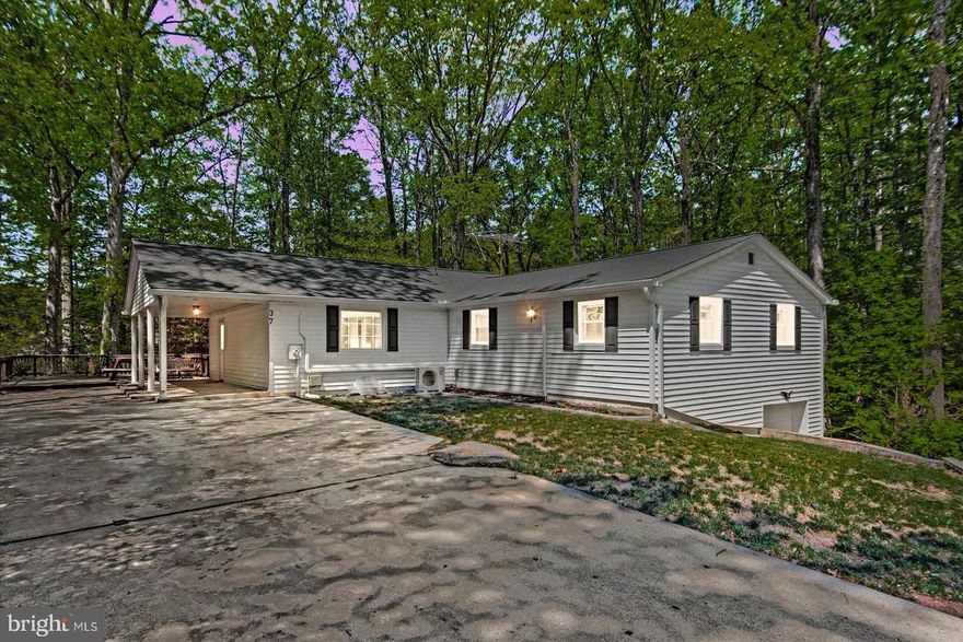 Welcome to 37 Hope Road, Stafford, VA. A rare opportunity to own a move-in ready home with public water and sewer, an oversized garage, and nearly an acre of land, all just minutes from I-95.

This beautifully refreshed home features fresh paint and new carpet throughout, offering a clean and inviting feel from the moment you walk in. With 3 spacious bedrooms, including an expansive primary suite, and 2 full bathrooms, the layout is designed for both comfort and functionality.

The large kitchen offers abundant cabinet and counter space, perfect for everyday living and entertaining.

The oversized garage provides exceptional flexibility, whether you need space for multiple vehicles, storage, or a workshop.

The finished basement adds valuable additional living space, including a bedroom ideal for guests, a home office, or flexible use to fit your lifestyle.

Step outside to enjoy a welcoming front porch and a rear deck, perfect for relaxing or entertaining. The 0.77-acre lot offers space, privacy, and room to enjoy the outdoors, something not easily found in this location.

Ideally positioned just minutes from I-95, this home offers the perfect balance of privacy, space, and commuter convenience.