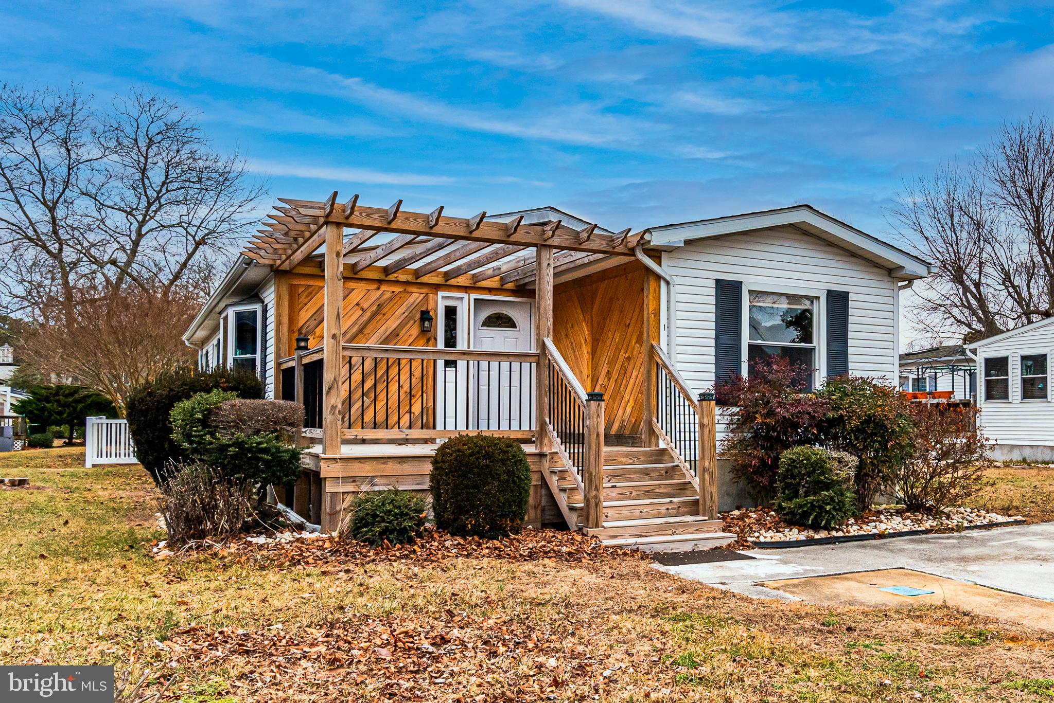 New Price!
Everything Recently Updated. Three bedroom, two bath home in Mystic Harbor. Neighborhood offers residents a variety of amenities including a community pool, playground, trash pick up, sport court, and boat/RV storage for homeowners . The community also has a clubhouse, and homeowners association (HOA) that manages common areas, including snow removal, grass cutting and trash services.
Kitchen has all new appliances . stove, refrigerator, dishwasher, and a new sink. Bathrooms are like new!
New carpet throughout along and hardwood floors in the living room
All new front poarch and updated side poarch accessed from the kitchen.
This home is like new in all respects.
A few minutes from Ocean City, and Historic Berlin Maryland. Vacant and available to show anytome.
Call listing agent for access.