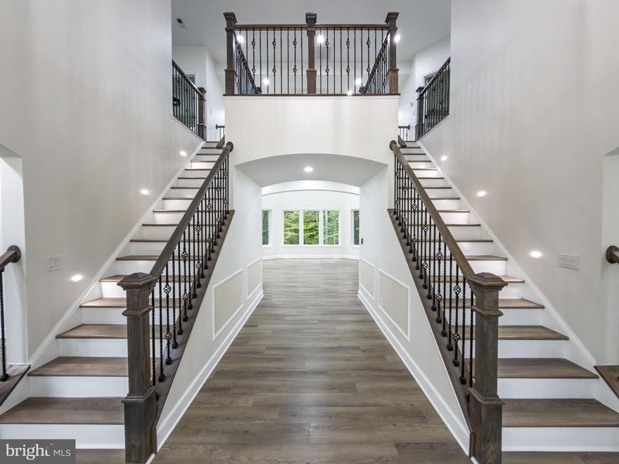 Absolutely Stunning Brand-New Modern Colonial!
<br>
Discover the perfect blend of modern luxury and timeless elegance in this custom-built masterpiece, showcasing three levels of refined living with 5 spacious bedrooms, 5 full bathrooms, and nearly 6,500 sq. ft. of beautifully finished space — ideally located in the highly sought-after Laurel Ridge Subdivision.
<br><br>
From the moment you enter the grand double-staircase foyer, the craftsmanship and attention to detail are undeniable. Soaring ceilings, gleaming floors, and designer light fixtures set a sophisticated tone, while the open layout seamlessly combines comfort and style in every room.
<br><br>
Built with precision and care, this home reflects a commitment to uncompromising quality — where no corners were cut and only premium materials were used. Every element, from the foundation to the final finishes, was thoughtfully designed for durability, elegance, and lasting beauty. This is not a home built for speed or savings — it’s a home built for excellence.
<br><br>
The two-story family room serves as the centerpiece, featuring a striking modern ceiling fan, custom lighting, and an elegant fireplace that adds both warmth and character. The chef’s kitchen is truly a showpiece — highlighted by a circular tray ceiling, stainless steel appliances, premium granite countertops, custom cabinetry, a massive center island, and built-in accent lighting that blends form and function. From the kitchen, step through the sliding glass doors to enjoy a serene, private view of the trees.
<br><br>
Throughout the home, exquisite millwork — including crown molding, chair rail, modern octagonal coffered ceilings, and shadow boxing — elevates the design. Recessed lighting, chandeliers, and decorative sconces complete the home’s refined ambiance. Upstairs, each bedroom offers generous closet space and contemporary fixtures, creating a perfect balance of comfort and sophistication.
<br><br>
The fully finished lower level expands the living space even further — ideal for a home theater, gym, or recreation area — with direct walk-up access to the backyard.
<br><br>
Step outside to your private outdoor retreat, designed for both entertaining and quiet relaxation. Additional features include a two-car garage, ample storage, and access to community amenities such as golf, pools, tennis courts, walking trails, and playgrounds.
<br><br>
Perfectly located just minutes from the new VA Hospital, Spotsylvania Hospital, I-95, VRE, shopping, dining, and the University of Mary Washington — this home offers an exceptional blend of elegance, comfort, and convenience.
<br><br>
Every detail has been executed with integrity, care, and craftsmanship — making this one-of-a-kind residence a true definition of modern luxury living.