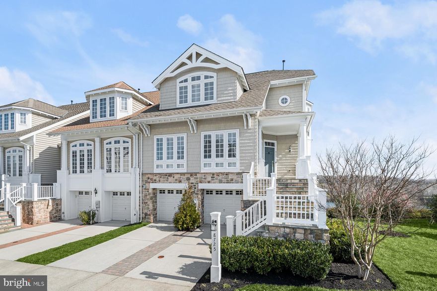 Welcome to 8725 Lake Edge Drive, an exquisite townhome nestled in the prestigious gated community of Stone Lake in Laurel, MD. With 3 bathrooms and 2878 square feet of living space, this residence offers a harmonious blend of luxury and tranquility.

The elegant stone exterior sets the stage for the sophistication found within. The main level presents a spacious living room flowing seamlessly into a formal dining area, perfect for hosting intimate gatherings. The family room, featuring a welcoming gas fireplace and enchanting views of the tranquil Stone Lake, effortlessly connects to the gourmet kitchen, complete with quartz countertops, stainless steel appliances, and a quartz island with seating. A walk-in pantry and a breakfast nook with built-in seating and a bay window complete the culinary experience.

The upper level hosts two bedrooms, including a guest bedroom with an ensuite bathroom and a laundry room for added convenience. The primary suite is a true sanctuary, offering views of Stone Lake, a private balcony, a sitting area, and two walk-in closets. The ensuite bathroom features a spacious walk-in tiled shower and a jetted soaking tub overlooking the lake, providing a spa-like retreat.

The lower level is perfect for recreation, featuring a generous-sized recreation room, a third bedroom, a full bathroom, and a stone patio with mesmerizing lake views. The home also includes a spacious 2-car garage and ample storage.

The Stone Lake community offers an elegant lifestyle with its gated entrance and an array of amenities, including a 25-acre lake, tennis courts, walking paths, a boat house, a beach, piers, a putting green, and a tot lot. Quick access to commuter routes ensures convenience, and you're just moments away from shopping and dining.

Don't miss the opportunity to experience the epitome of luxury living at 8725 Lake Edge Drive. Schedule your private tour today and immerse yourself in the serene beauty of Stone Lake.