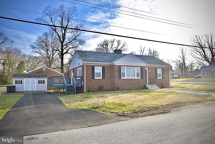 Move In Ready fully renovated brick rambler located in District Heights right on the Suitland border.  The contemporary home features over 2500sf.  Kitchen comes equipped with white cabinets, stainless steel appliances, granite countertops , recessed lighting, ceramic tile floors, pantry,  and exterior door to huge patio perfect for grilling.  Spacious LR/DR area with recessed lighting and fireplace featuring beautiful hardwood floors.  3 bedrooms on main level with wall to wall carpeting and brand new bathroom. Lower level features huge basement with recessed lighting, laundry room, 1 bedroom, and brand new full bathroom.   Outside of home features newly paved driveway to fit at least 4-5 cars, large shed, huge patio, and walk out from basement.  Home is conveniently located minutes away from metro stops, Suitland Metro Station, Shopping, Restaurants, Entertainment, and Gyms. Walk the family to the neighborhood park.
