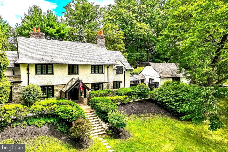 Welcome to your dream Tudor masterpiece in the heart of Wayne—a timeless 1900s gem meticulously reborn in 2025 with a complete, top-to-bottom luxury renovation that seamlessly blends historic charm with sophisticated modern living.

Perched on an extraordinarily rare 1.4-acre private oasis (one of the largest lots in Wayne), this stunning 4-bedroom, 3 full and 2 half bath home offers nearly 5,000 square feet of elegant living space, all enhanced by preserved architectural details and brand-new high-end upgrades.

Step through the grand foyer into light-filled interiors where classic elegance meets contemporary comfort: a cozy living room flows effortlessly into a breathtaking sun-drenched family room, featuring expansive windows, custom built-ins, French doors, and a charming fireplace—perfect for intimate gatherings or lavish entertaining.

Host unforgettable dinners in the radiant formal dining room, complete with a convenient wet bar and butler's pantry leading to your gourmet kitchen. Retreat upstairs to the serene primary suite, boasting a spa-like bathroom with soaking tub and exclusive access to a private roof deck for quiet mornings or starry evenings. Three additional generous bedrooms, two full baths, and a versatile attic space (ideal as a home office, studio, playroom, or fifth bedroom) provide ample room for family and guests.

The expansive lower level impresses with bright windows, abundant storage, and a brand-new washer/dryer for ultimate convenience. Every detail of the 2025 renovation shines: rebuilt grand entry staircase and landing, two new exterior pathways, freshly repaved driveway (with entry off Old Eagle School Road), and added parking on Homestead Road for effortless access.

Outside, paradise awaits—a detached 3-car garage with new automatic doors and a spacious unfinished bonus room (complete with powder room) ready to customize as your home gym, office, or creative studio. Dive into summer fun around the fenced in-ground pool (with new safety cover), relax on the expansive patio, or let imaginations run wild in the vast flat yard—perfect for play, gardening, or epic outdoor entertaining.

All this in the award-winning Tredyffrin-Easttown School District, just minutes from Wayne's charming shops, fine dining, parks, and SEPTA train for easy commutes. This one-of-a-kind property delivers unmatched acreage, seclusion, and turnkey luxury in one of the Main Line's most coveted locations. Don't miss your chance to own this exceptional retreat—schedule your private showing today!