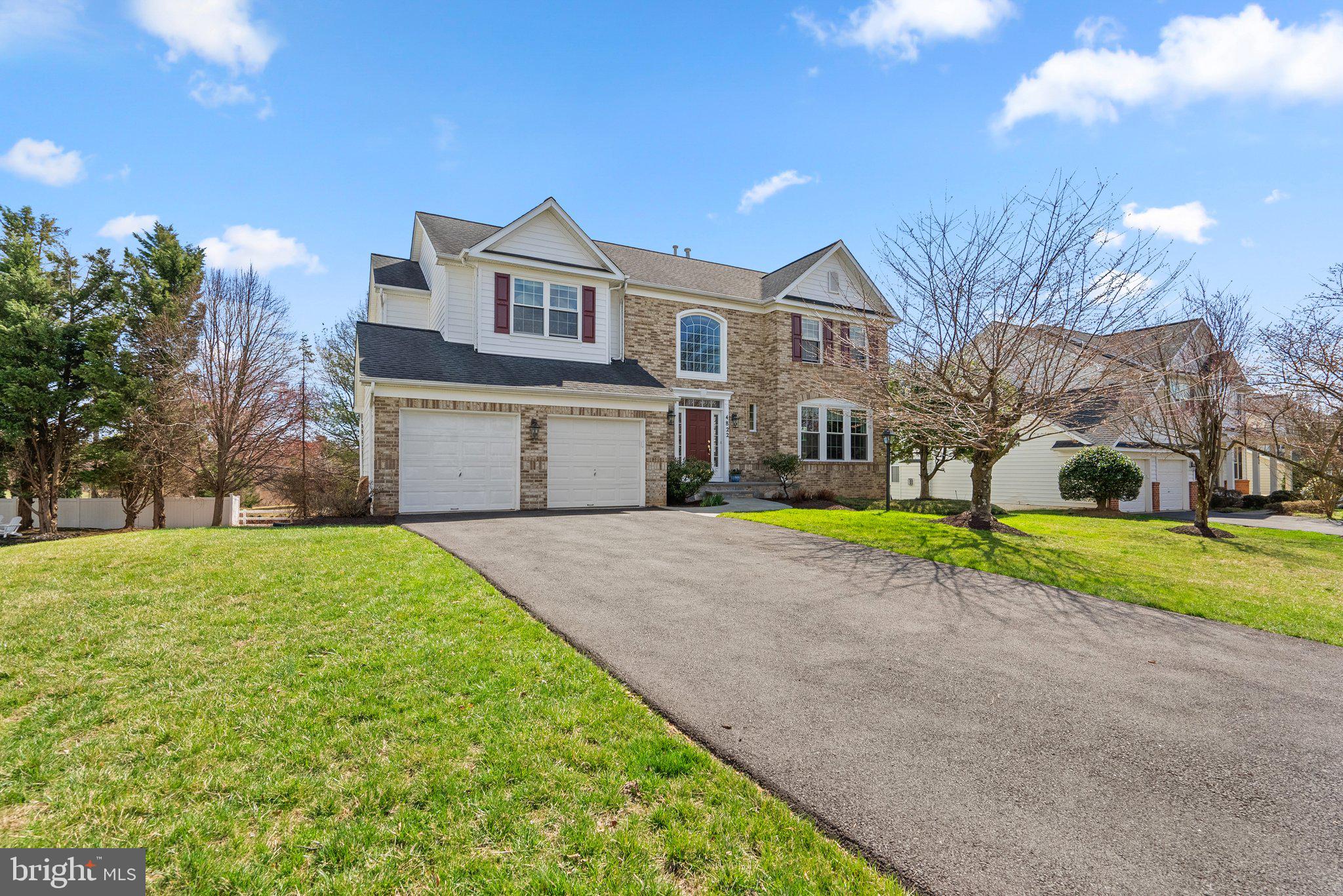 Nestled in the highly sought-after Barnsley Manor Estates neighborhood, this gorgeous home has everything you've been looking for! Inside, you will find a timeless and classic layout complete with a two-story foyer, open concept family room and kitchen, morning room, and additional living room and dining room. The light and airy family room also features a fireplace and tons of windows overlooking the backyard. Upstairs, you will find 4 spacious bedrooms, including an expansive primary suite with walk-in closets and a beautifully appointed primary bath. The fully finished basement walks out to the back yard and comes complete with a wet bar and a bonus room that is currently being utilized as a theatre room! The gorgeous patio off the back is the perfect place to unwind after a long day. One of the best parts is being just steps away from the amazing community pool, walking path, trails, tennis courts, and more! You won't want to miss this one, so schedule your private showing today!