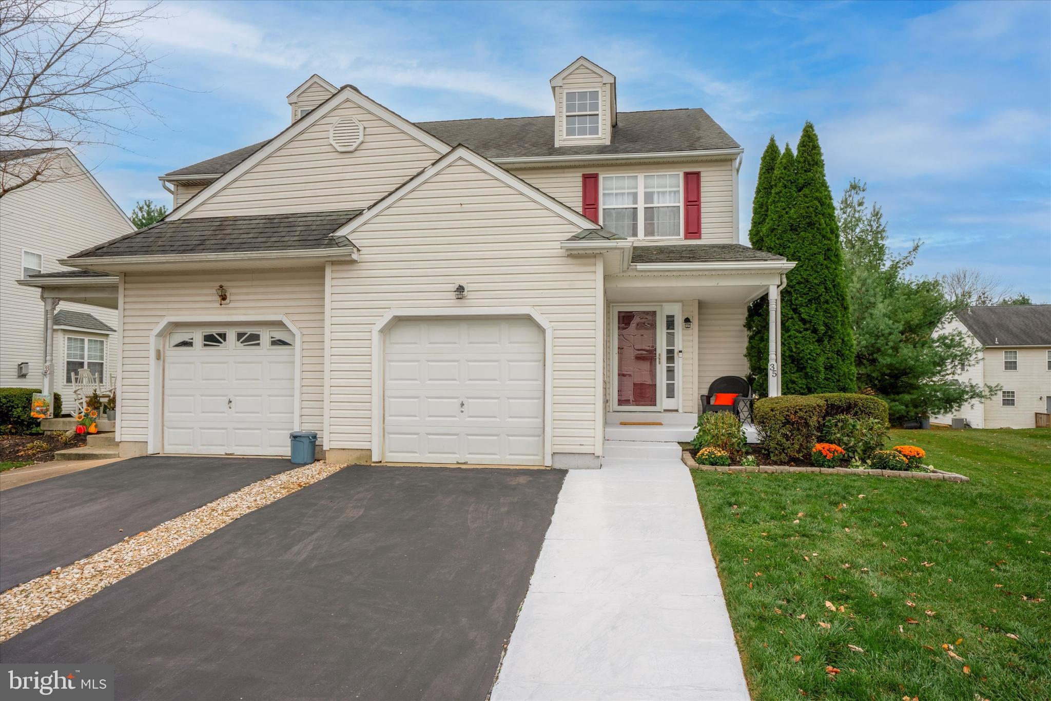 Welcome to 35 Steeplechase Circle. This 3 bedroom 2.5 bathroom twin is located in the desirable Spring Valley neighborhood. Walk through the front door and enter the spacious living room with a gas fireplace. Adjoining to the living room is a dining area and an eat in kitchen with stainless steel appliances. There are sliding doors in the kitchen to head out to the large deck that is great for entertaining and leads to a nice side yard. You will also find a half bathroom and access to the garage and basement on the main level. Make your way upstairs where you will find the primary bedroom with vaulted ceilings, 2 closets and a full bathroom. There are two additional generous size bedrooms and a full bathroom. The basement is finished for more living space, storage and laundry. Throughout the house you will find great closet space, the kitchen was updated in 2019, the deck was installed in 2019 and the driveway and front walkway were sealed November 2023. Great location! Schedule your appointment before its too late!
