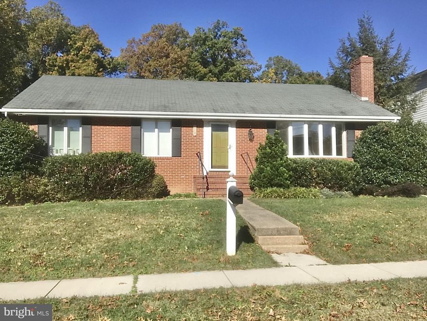 3 bedroom, 1 full bath, and 1 half bath rancher available in Michaelton Manor! This home features crown molding,  hardwood floors, 2 wood-burning fireplaces with brick mantels, and 3 main-level bedrooms. Living room and dining room with box bay windows. Gourmet kitchen with eat-in table space. Shared master bath and full bath with standing glass shower, soaking tub, and double vanities. Large recreation room, bonus room, workshop, and tons of extra storage on the lower level. Long driveway for parking and large backyard with patio.