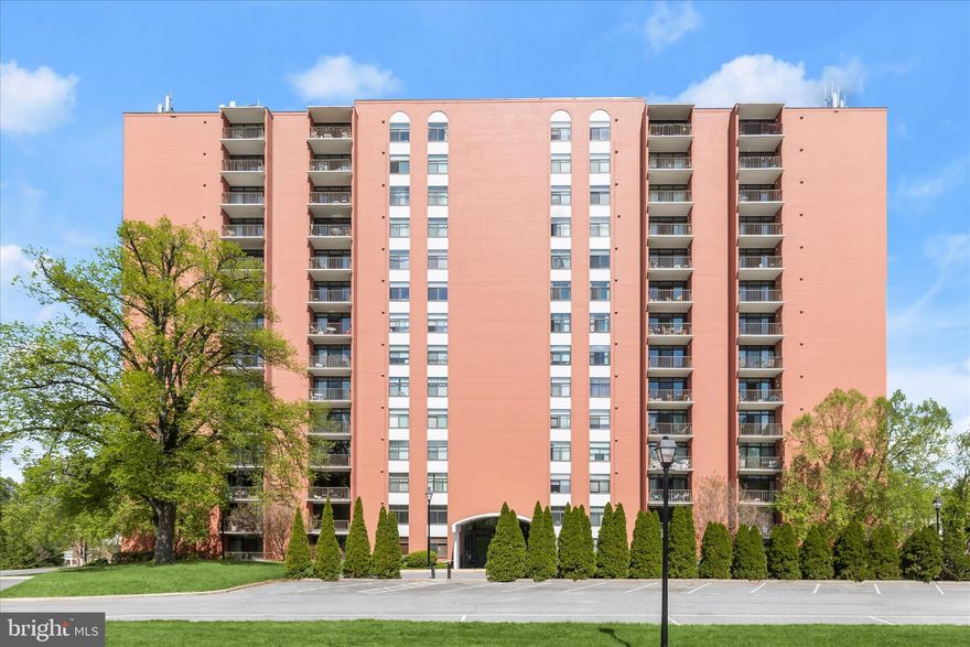 Welcome to this beautifully maintained 4th-floor condo in the highly sought-after gated community of Dulaney Valley Gardens, offering the perfect blend of comfort, style, and convenience. This inviting home features gleaming wood floors throughout, a kitchen with sleek stainless-steel appliances, granite countertops, a breakfast bar, and ample cabinetry, all seamlessly flowing into the open living and dining areas. The light-filled living room is enhanced by crown molding and recessed lighting, creating a warm and welcoming space to relax, with direct access to a private balcony, perfect for morning coffee or unwinding in the evening. The spacious bedrooms provide comfort and privacy, including a primary suite with a walk-in closet, an additional closet, and an attached full bath. A second bedroom with two closets and an additional full bath offers ideal accommodation for guests or flexible living. Enjoy a low-maintenance lifestyle with exceptional community amenities, including an in-ground pool, walking paths, tennis and basketball courts, a dog park, community center, library, tot lots, and more, perfect for both recreation and relaxation. Ideally located near everything Towson has to offer, including parks, shopping, dining, and major commuter routes, this home delivers both convenience and lifestyle. Additional highlights include a laundry room and secure storage, adding everyday ease and extra space. Move-in ready, this condo is the perfect combination of functionality and comfort.