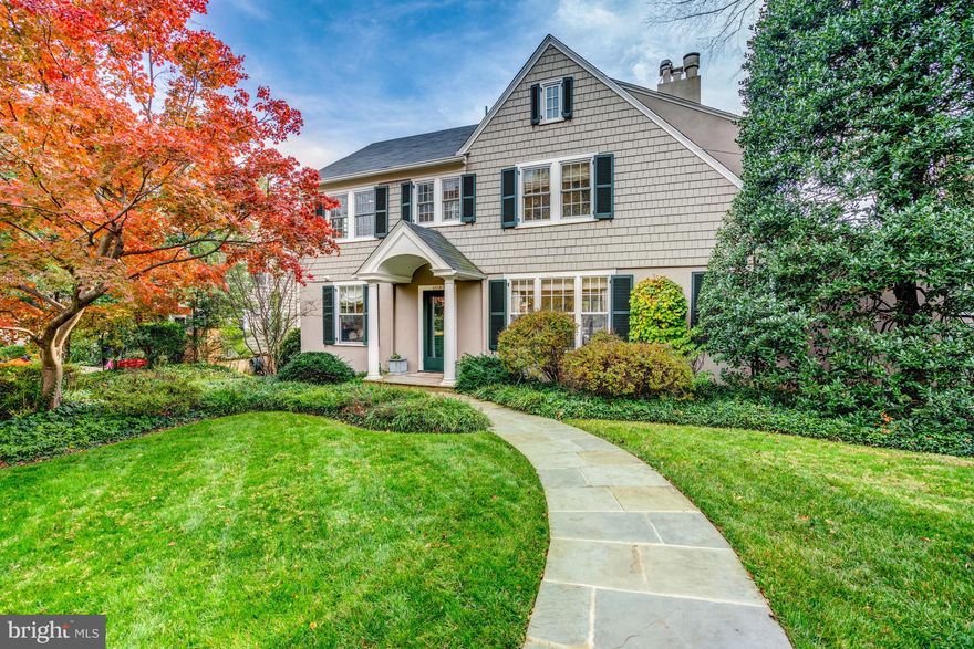 Offers, if any, due Wednesday 3/8 by 9am! Situated on an expansive 15,000sqft lot in the highly sought-after Wesley Heights neighborhood, this five-bedroom, three-and-a-half-bath colonial features recent updates and a sun-filled and spacious floor plan. The interior highlights beautiful finishes including hardwood floors, stunning millwork and crown moldings, and custom built-ins. The main level boasts a gracious foyer, elegant formal dining room, spacious living room with a wood-burning fireplace and french doors leading to the expansive back deck, and a den or private office with built-ins and additional fireplace. The recently renovated gourmet kitchen offers beautiful cabinetry (including a large appliance garage hutch to hide all of your kitchen gadgets), a center island with seating, a mix of Cardosa honed granite and White Carrara honed marble, coffered ceilings, high-end stainless steel appliances (including a Sub-Zero fridge and Wolf six-burner range with griddle and double oven), and is open to the sun-filled breakfast area overlooking the private backyard. The butler’s pantry connects the kitchen to the formal dining room and offers a wet bar with a beverage center, pantry storage with a separate broom/vacuum closet, and a day office closet with a filing drawer.  The expansive deck off the main level was completely rebuilt and overlooks the flat private yard. It connects to the rare studio space above the detached garage, the perfect spot for entertaining. 

On the second floor, you will find the luxurious primary suite, complete with vaulted ceilings, a Juliet balcony overlooking the backyard, and an ensuite bathroom with a separate shower and soaking tub. Completing this level are three additional bedrooms and a hall bathroom. The third level offers a large unfinished attic ideal for storage, or potential to be finished into an additional bedroom or recreation room. Rounding out the home, the walk-out lower level features an additional private office, laundry room, ample storage, an additional bedroom and full bathroom (making it the ideal in-law suite), and a large recreation room with access to the covered back patio that connects to the detached two-car garage. The professionally landscaped exterior serves as an extension of the home, including a covered rear patio off the lower level, an expansive deck off the main level, and a large, flat, fenced-in backyard with mature plantings and trees. 

Wesley Heights is nestled in the suburban hills of Northwest DC, close to American University, and just 15 minutes from downtown DC. This proximity as well as the use of the nearby Tenleytown Metro station makes this an ideally convenient location for anyone working in DC. Wesley Heights is surrounded by parks such as Battery Kemble Park and Glover Archbold Park, where residents can enjoy many outdoor activities.