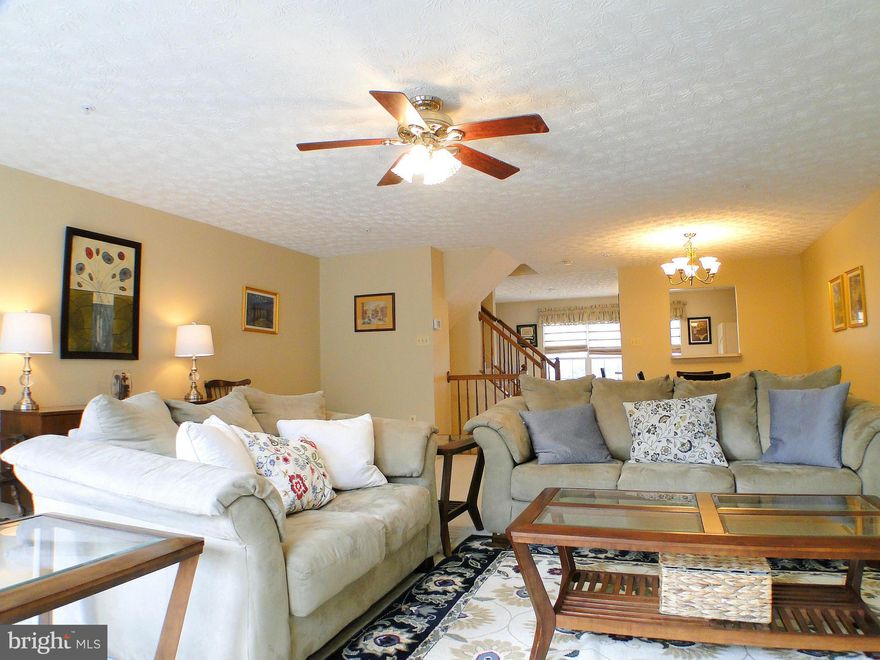 Spacious End of Group 3 bd, 2.5 Bt, full bump-out Townhome w/ over 2,000 sq feet of finished living space.. One-car attached garage, fenced-in yard, Huge Lower level Rec Room w/ Newer Carpet, Open Living room w/Gas fireplace, 42 inch cabinets, center island, gas range, large pantry, master bedroom w/ sitting area, vaulted ceilings, double sided fireplace, soaking tub, double sinks, walk-in closet.