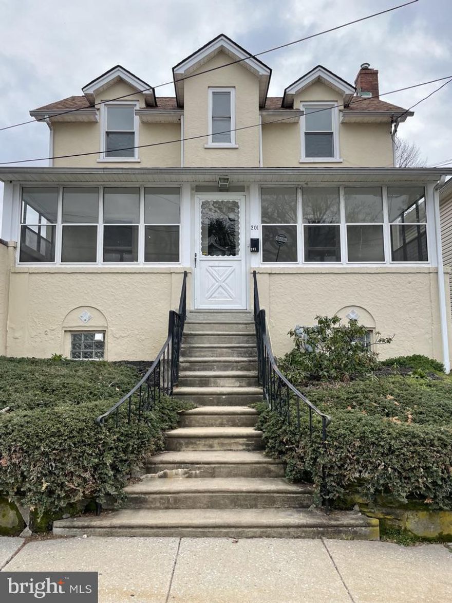 Enter this charming home through an enclosed front porch.  Interior amenities include hardwood flooring on the first floor, oversized rooms, windows and natural light throughout. Laminate floors on the upper level. 3 bedrooms with nice size closets on the second floor plus extra room, which could be easily used as an office. One full bath on 2nd level and 1 half bath just built on main level and 1 half bath in basement. Sliding glass entry door  in the dining room to give access to a private back yard with flagstone patio. Washer & Dryer located in the basement with Bilco door access to outside.
Private driveway allows for parking off the street. Central Air. 
This neighborhood has sidewalks within the award-winning Lower Merion School District, offers a fast commute to Philadelphia, and is a short walk to many of Ardmore’s civic institutions and public amenities, including: A post office, library, ice skating rink, public swimming pool along with lighted tennis and basketball courts, Ardmore Avenue Community Center, the Ardmore train station, and the Suburban Square shopping center which includes several restaurants that this great area affords you!