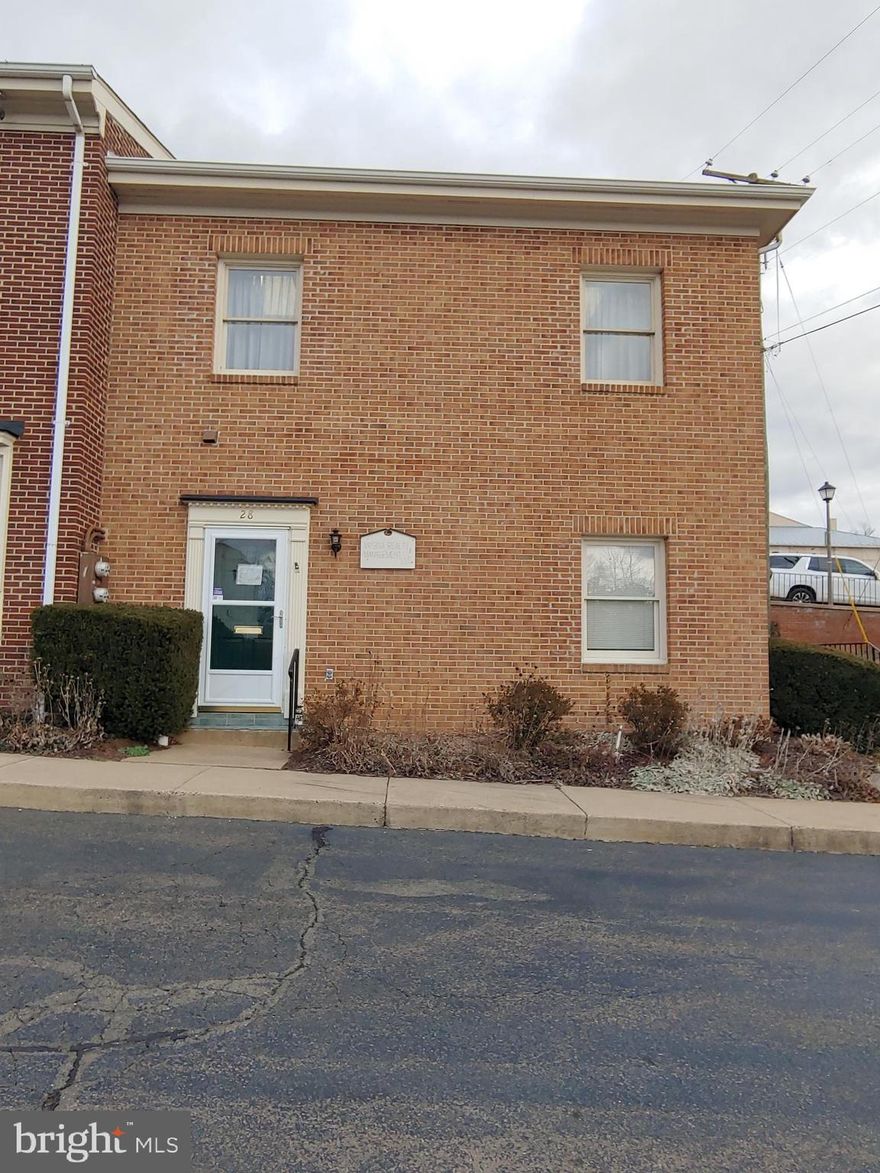 Great location for your office off of Waterloo Street in historic Warrenton within close proximity to Main Street or Fauquier County Offices and other retail and offices in Town.  You can have signage on the building by your door and can have your name on the building directory seen from Waterloo Street.  HOA is very proactive especially when there is snow to have the sidewalks cleared and parking lot cleared. Floorplan will allow you to have a receptionist area and two large offices or you can open it by removing the one division wall to have one large L shaped space depending on your specific needs. One area has built in book shelves for display.  Small kitchnette and half bath.  Great location as unit has direct access within a few steps from parking lot with allowance for two vehicle parking spaces per condo unit designated by HOA.  Do not need to move your car every two hours on John Marshall Street to avoid a parking ticket or park in town parking lots. Well natural lighted office with multiple windows, three of which are protected by bars for security and privacy.  Many county offices located as neighboring properties.  Prior usages of condo  include real estate office, lawyer office, seamstress and other condo units are various offices or professional services to include hairdresser, construction office, marketing office, etc.